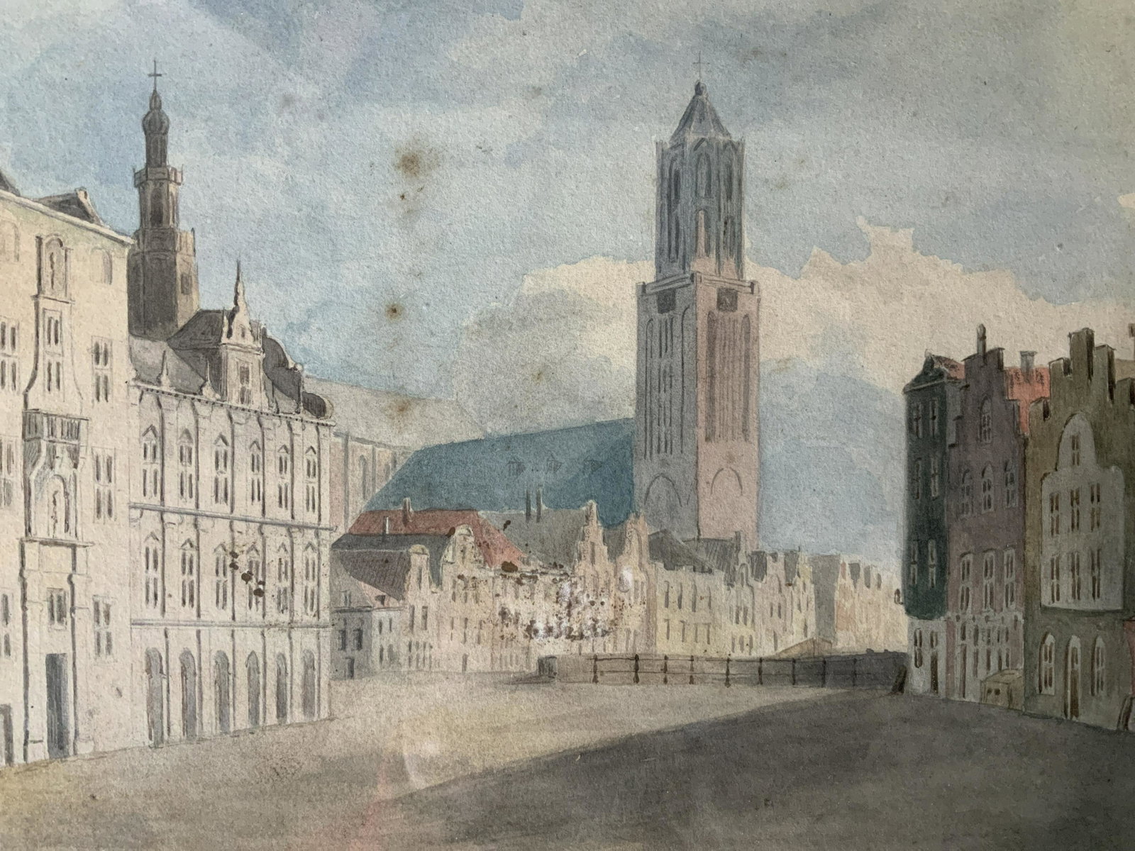 Dom Tower Watercolor Painting Artwork: Dom Tower Watercolor Painting, no apparent inscriptions or signatures, not examined out of frame, subject an empty street, measures 10 1/2 x 15 3/8 inches, gilt wooden frame, some scuffs and scratches