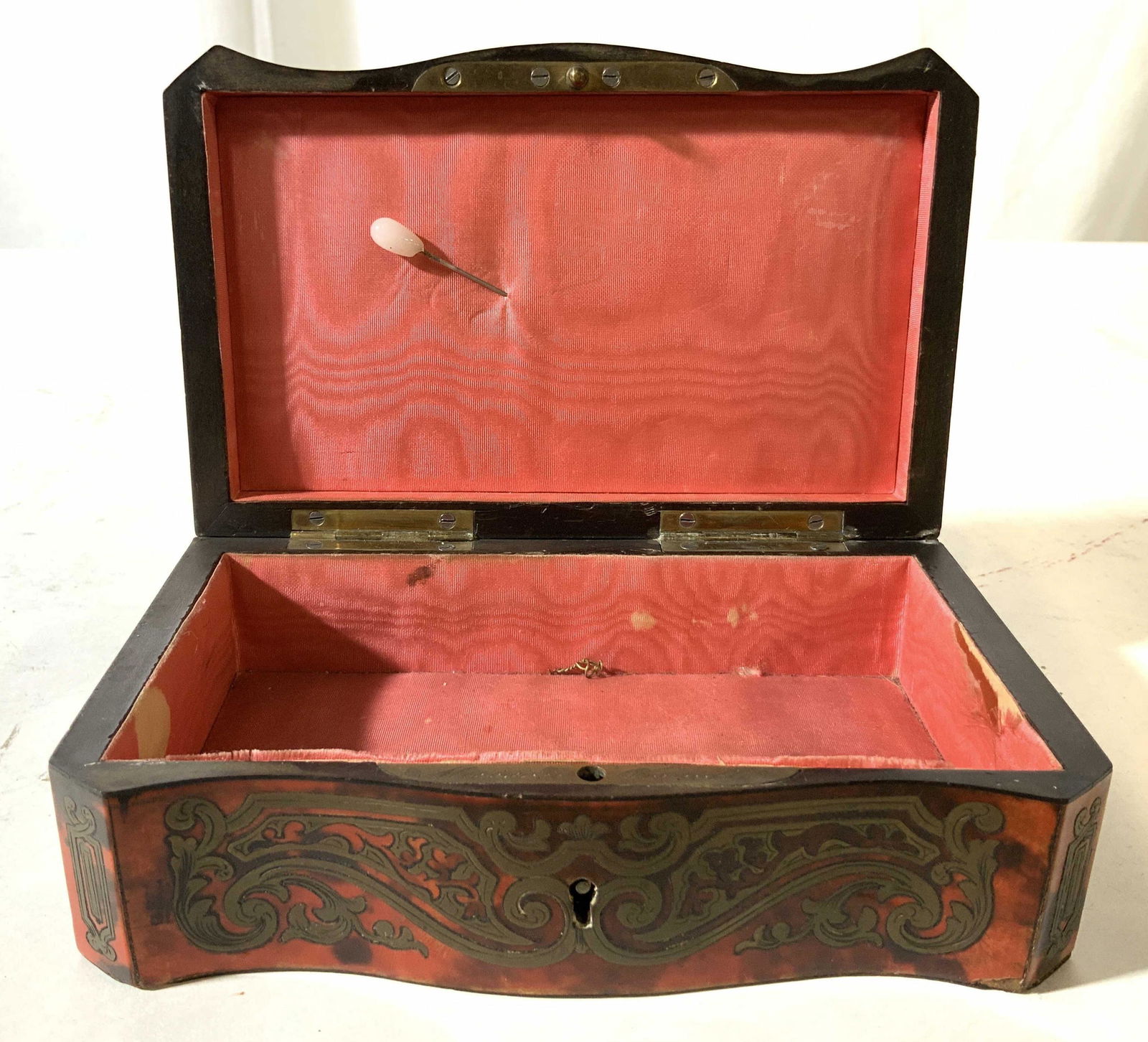 Antique Metal Lacquer Keepsake Box w Inscription: Silver toned metal in swirled design overplayed on lidded hinged red lacquer box, pink silk lining, jewelry box, trinket box, keep sake box, desk accessory, decorative object, inscription on inside br