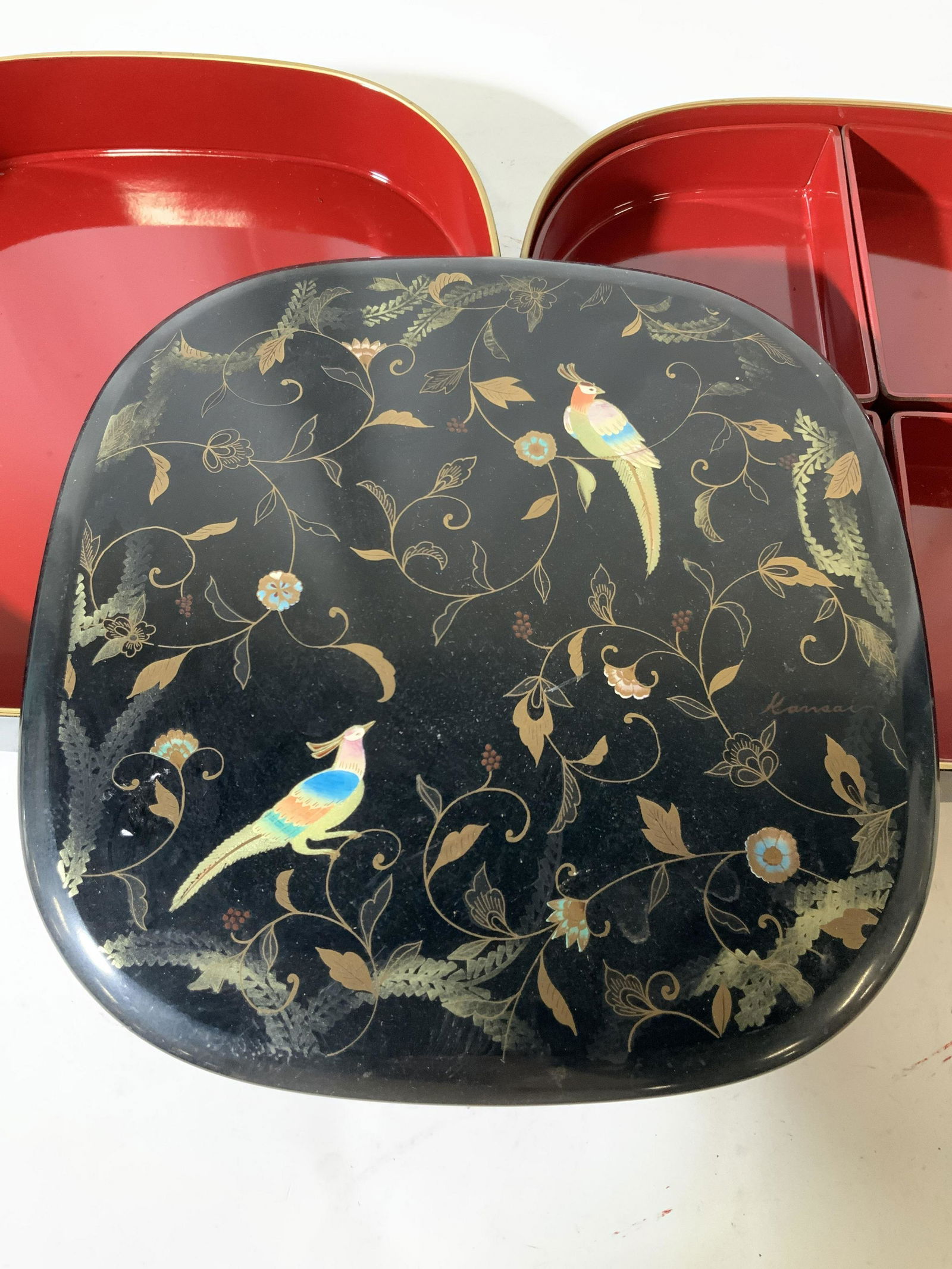 YAMAMOTO KANSAI hand painted Lacquered Box Set: Asian lacquered box set , 7 piece set, with fitted sections into large box, nesting stacking boxes and lid, lid is gold accented painted birds vines leaves, and floral design in scrolled style, Asian