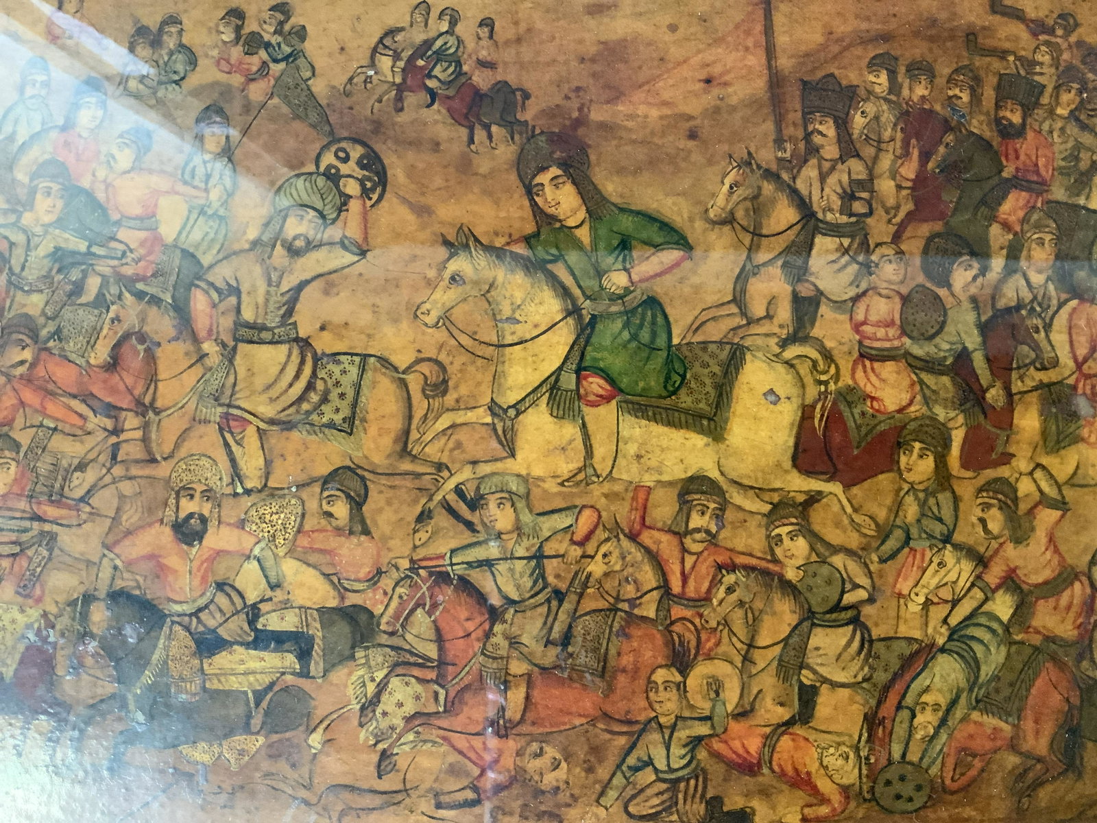 Middle Eastern Style Panel Painting, Battle Scene: Middle Eastern Style Panel Painting, Battle Scene, no apparent inscriptions or signatures, subject men on horseback fighting, measures 13 5/8 x 18 5/8 inches, decorative wooden frame, some losses to f