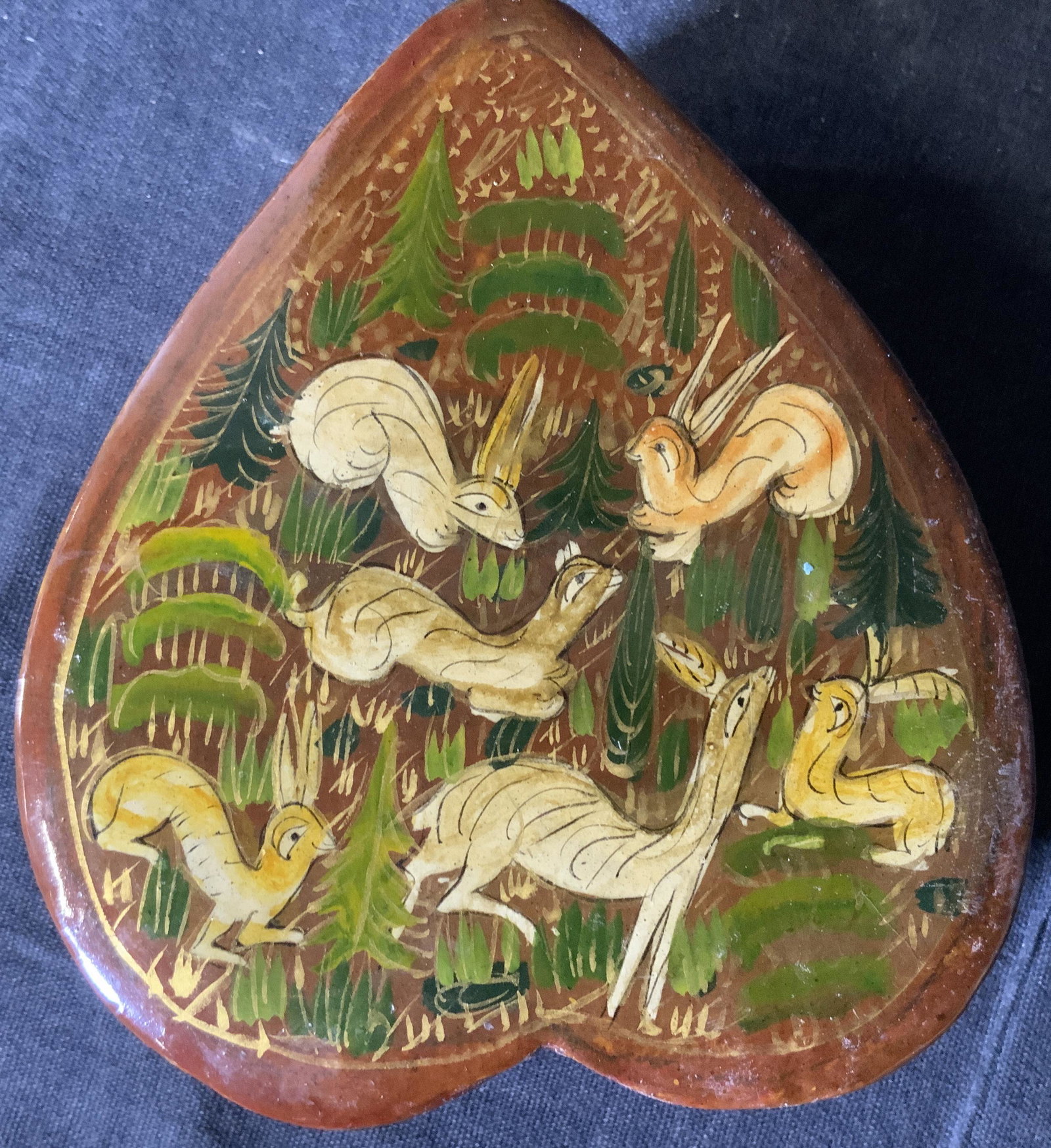 Lot 3 Asian Lacquered Trinket Boxes, Animals: Lot 3 Lacquered Trinket Boxes,different designs, geometrics, wood land creatures, rabbits, deer, squirrel, Asian boxes, hand painted, no apparent inscriptions or marks, heart shaped box measures 1 3/4