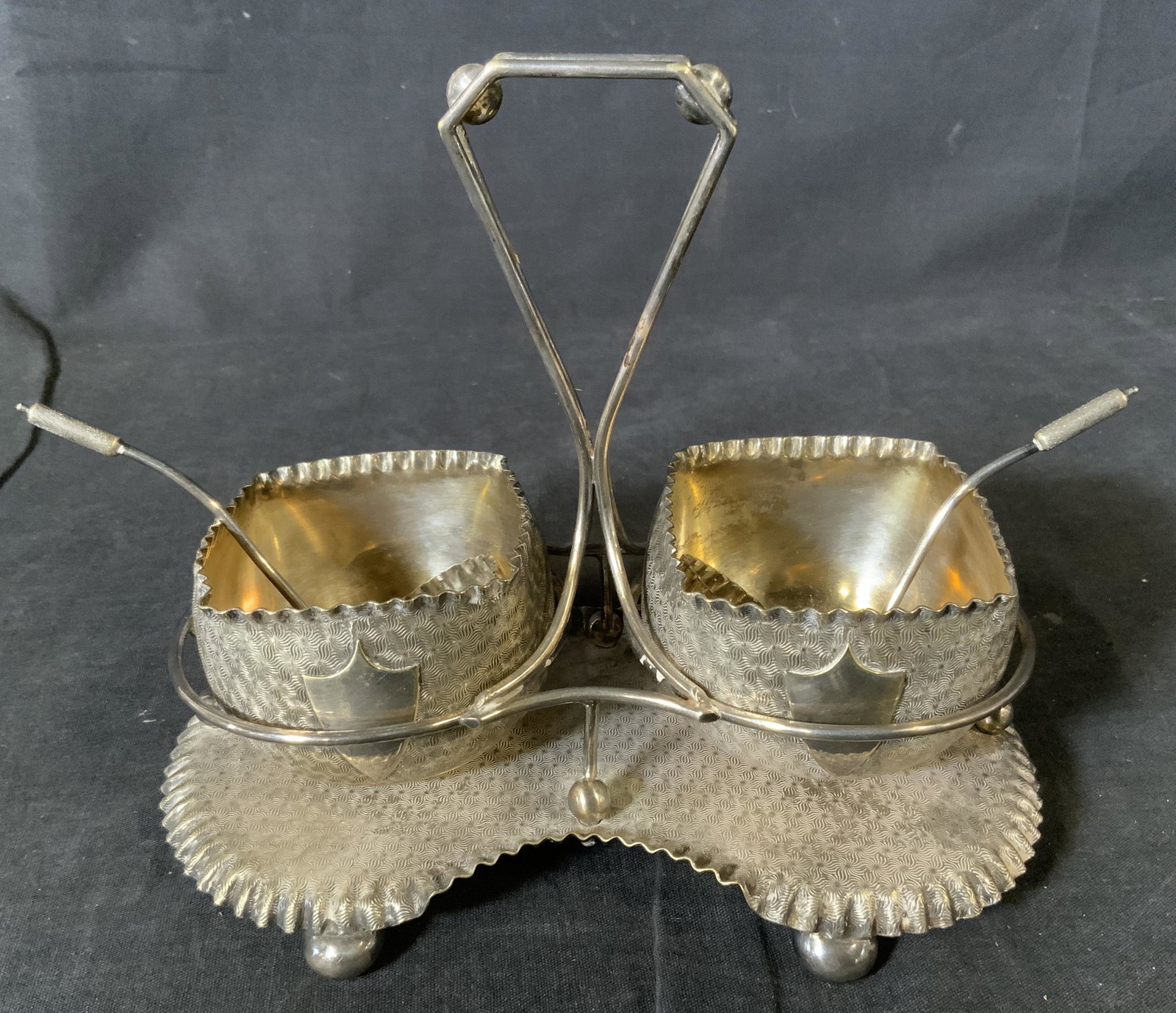Vintage Silver Plated Sauce Server: Vintage Silver Plated Sauce Server with engine turned etching, no apparent inscriptions or marks, measures 6 1/2 x 7 7/8 inches at widest point, some tarnishing and surface wear to piece, Property of 