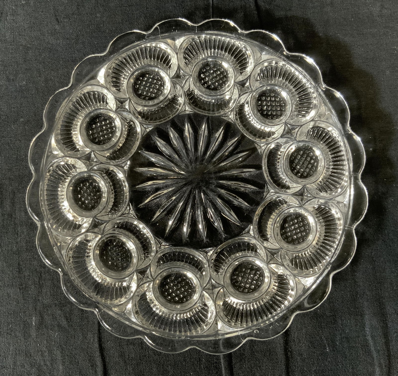 Lot 16 Glass Plates: Lot 16 Glass Plates, no apparent inscriptions or marks, smallest plate measures 5 7/8 inches in diameter, larger plates measure 6 inches in diameter, surface wear and chips to some pieces, Property of