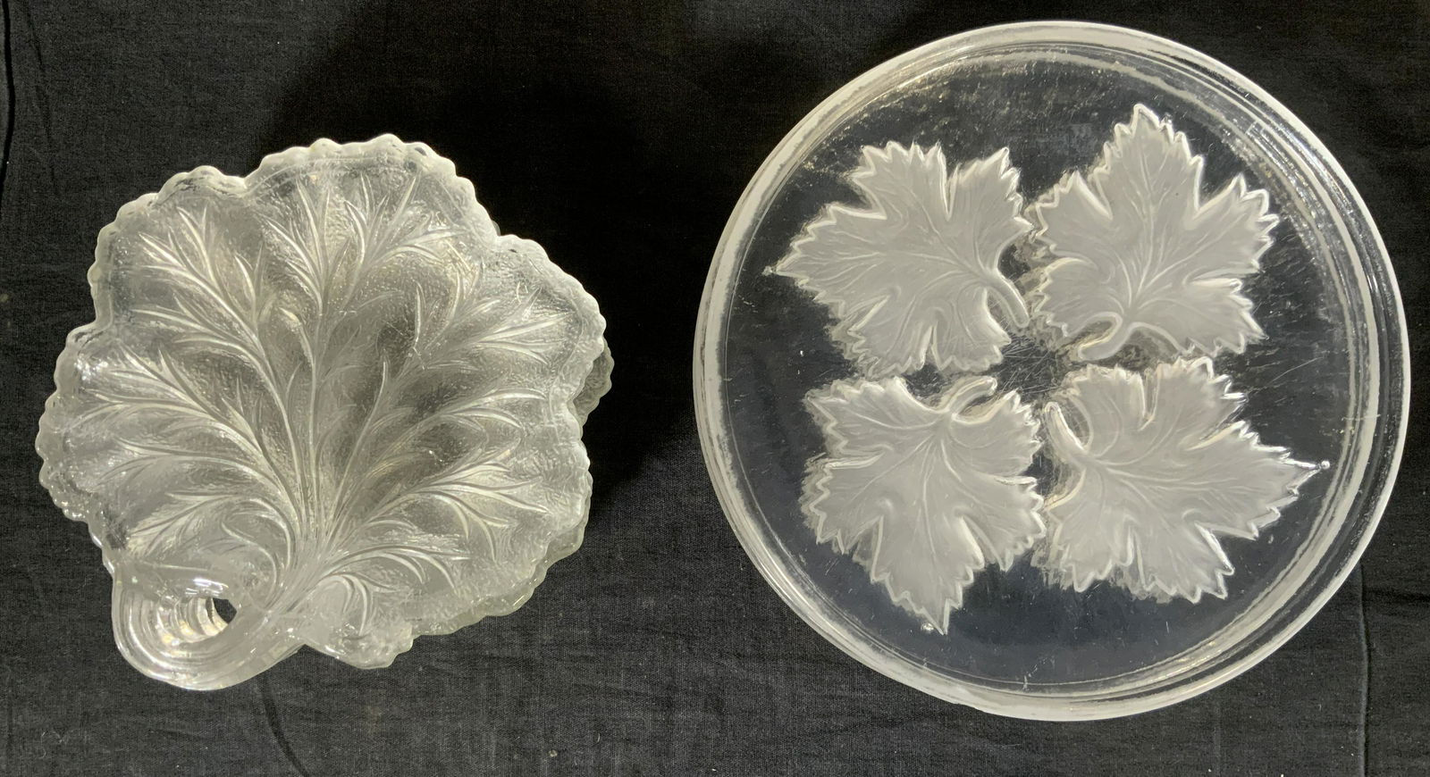 Lot 9 Glass Plates with Leaf Motifs: Lot 9 Glass Plates with Leaf Motifs, no apparent inscriptions or marks, smaller plates measure 6 1/8 inches wide, larger plates measure 8 1/4 inches in diameter, surface wear and chips to some pieces,