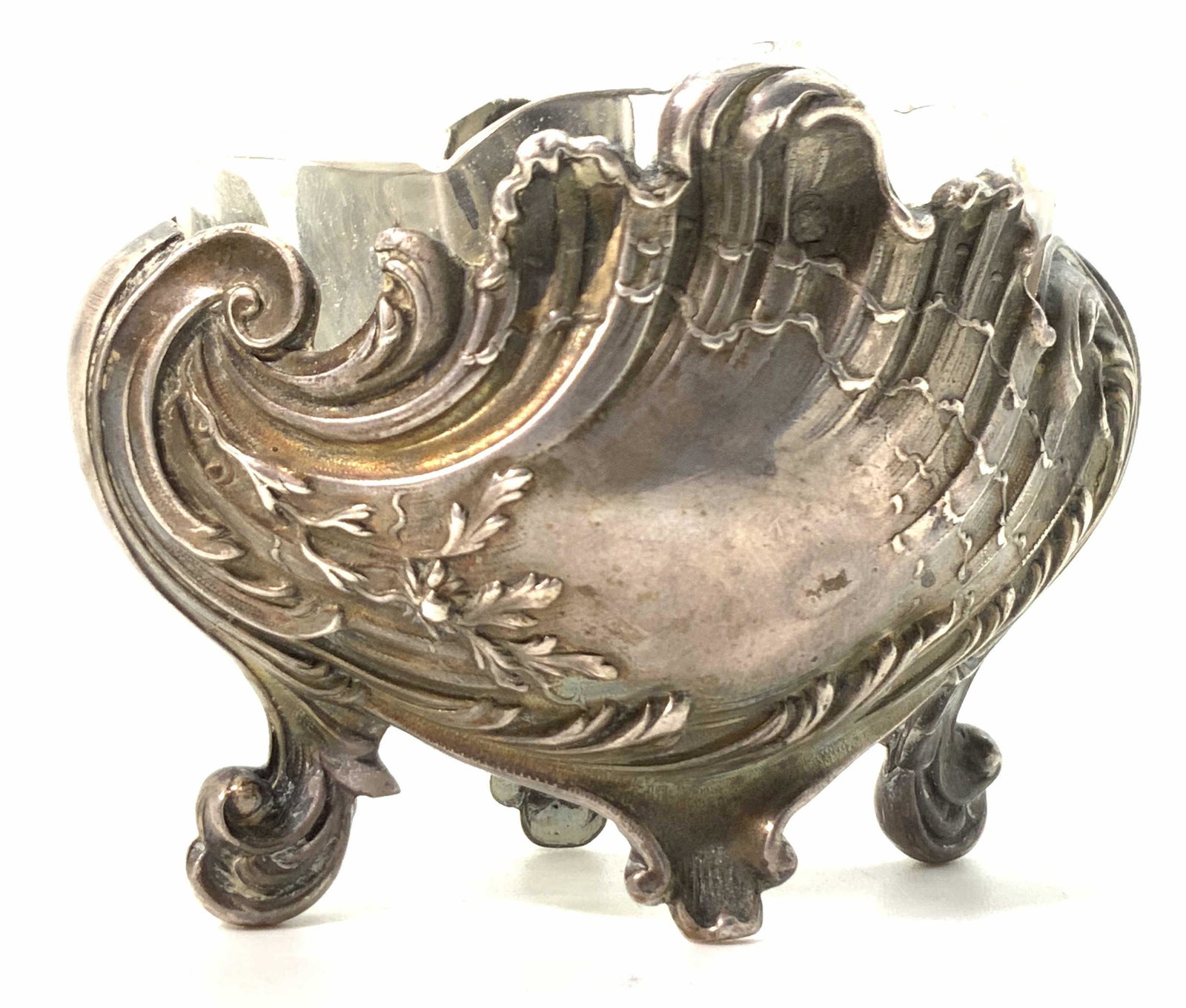 Vintage STERLING SILVER & Glass Salt Cellar: A vintage, possibly antique, sterling silver and glass salt cellar. The piece comes apart, the glass cellar is removable from the sterling base. The sterling base features Victorian style embossed and