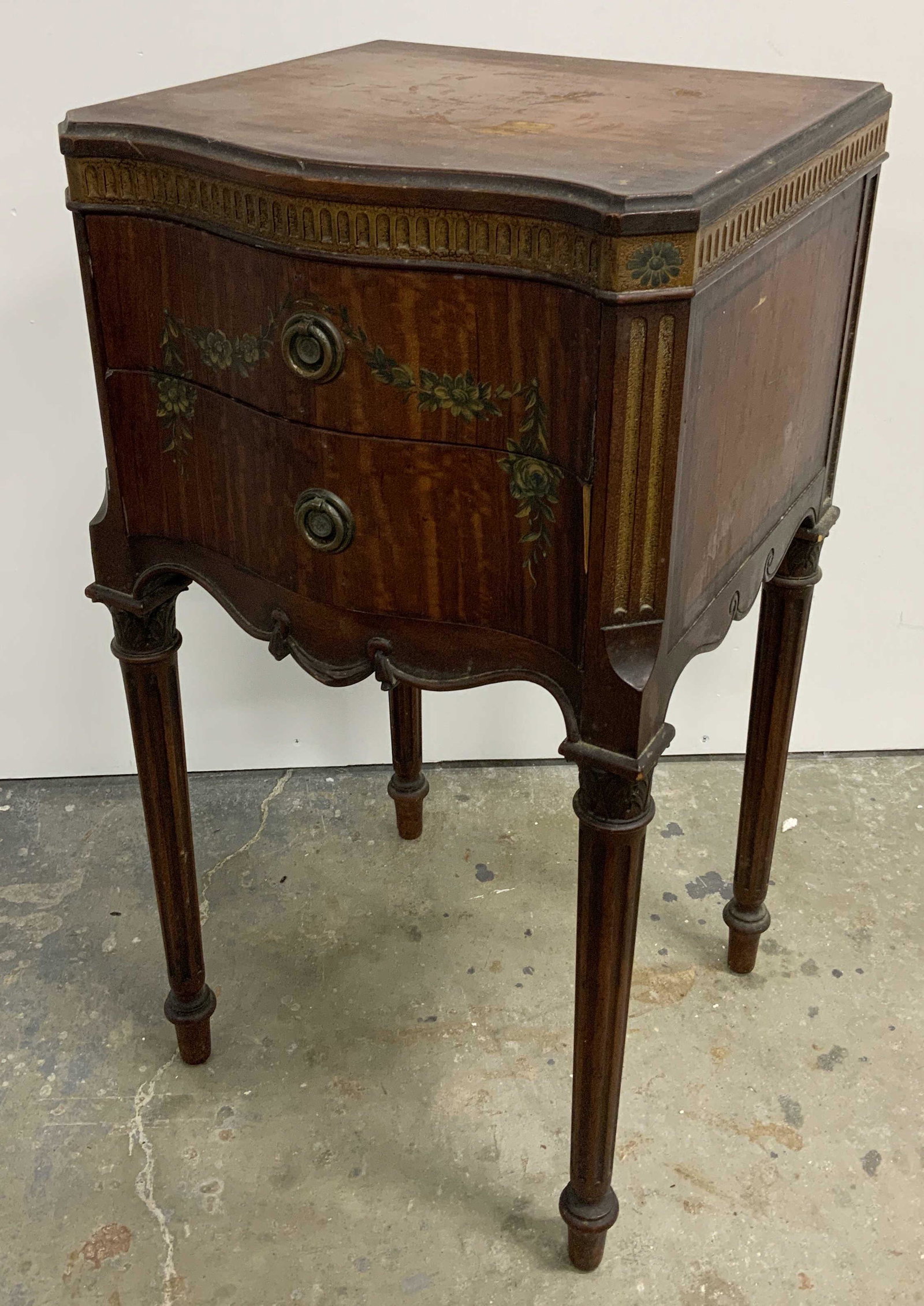 Antique Carved Wood Side Table: Antique side table, crafted from wood, detailing appears to be hand carved, appears to be veneered in some areas. Decorative artwork is hand painted. Measures approx 28 inches H, 14 inches W, and 14 i