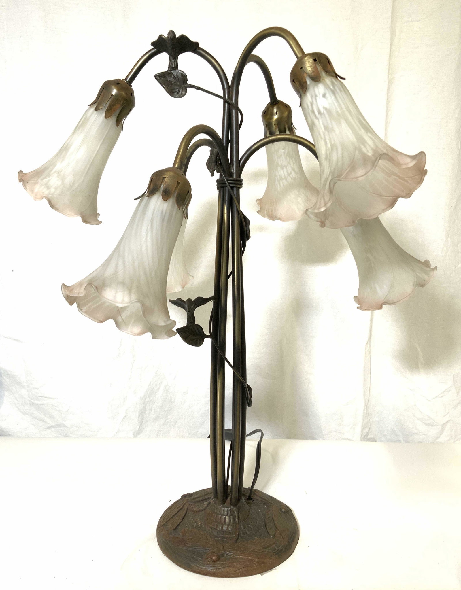Vintage Art Nouveau TIFFANY Lamp W Tulip Shades: Lamp is vintage possibly antique. Base of lamp is circular and has beveled dragonfly detail. Piece also has vine and stalk detail with vines & leaves wrapping around stalk. Stalk structures appear to 