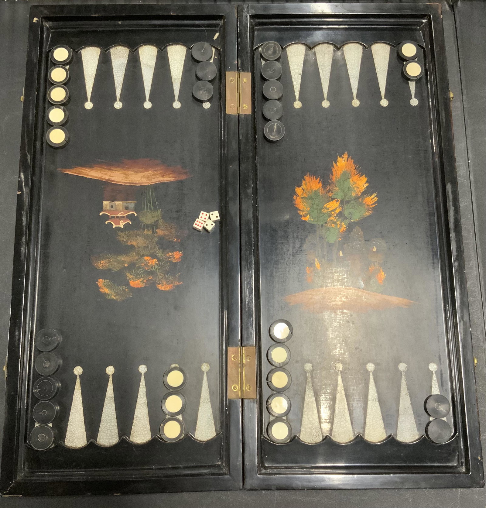 Vintage Backgammon Board & Accessories: Vintage, possibly antique, backgammon board. Can be flipped over and used as a chess/checkers board. Board can be folded and act as a container for the game pieces. Board is hand painted. Secured shut