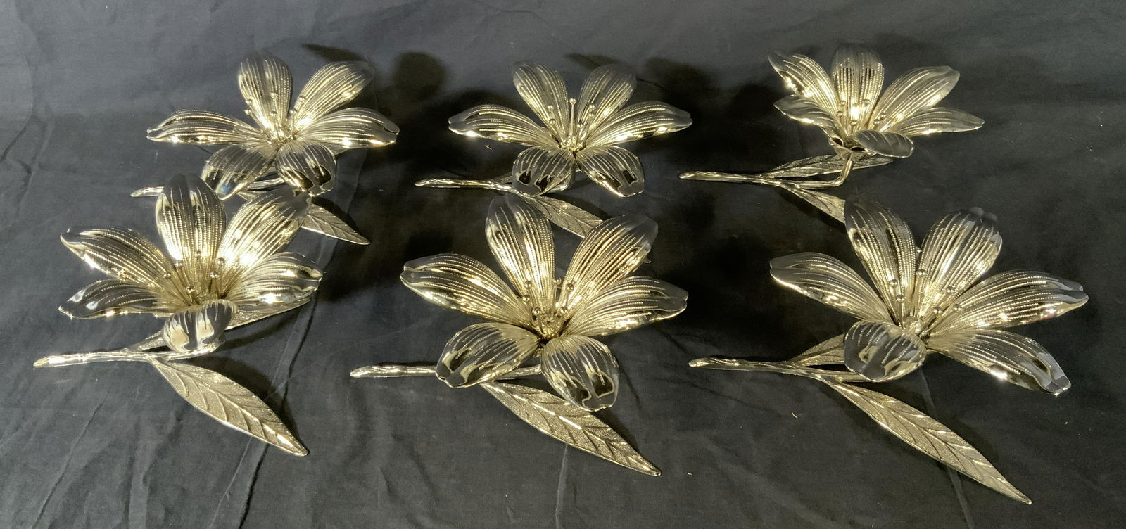 Set 6 Flower Tabletop Accessories: Set 6 Flower Ashtray Centerpiece, petals are detachable, no apparent inscriptions or marks, all measure 3 1/2 inches tall x 9 3/8 inches at widest point, in good condition, Property of Janine Metz est