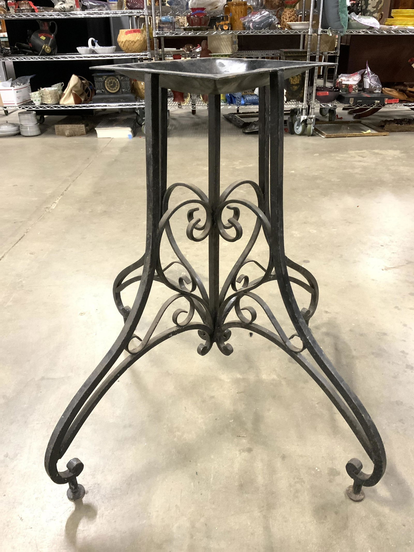 Vintage Iron Table Base: Table base is black toned and iron. Piece is vintage possibly antique. Piece has c and s curve structures. Base measures approx 29 inches tall 33 inches wide. Table base, metal table base, iron table