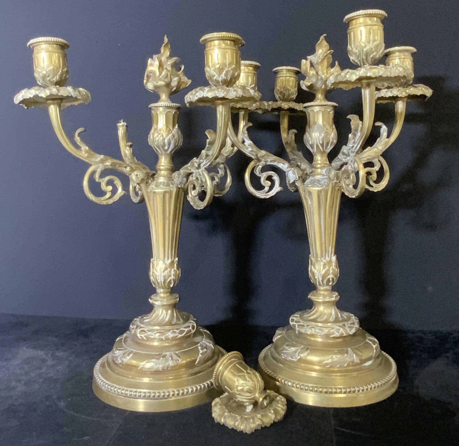 Pair Vntg Gilded Metal Rococo Style Candelabras,: Two vintage, possibly antique, matching four arm candelabras. Pair is gilded metal, weighty, possibly gilded bronze. Rococo style design. One arm is in need of repair, wear consistent with age & use. 