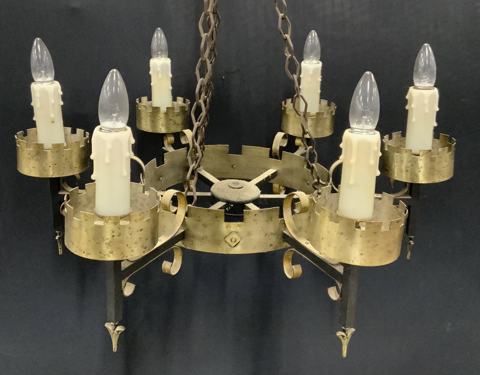 Vintage Metal Chandelier: Vintage light fixture, crafted from metal. Socket cases resemble melting candles. Measures approx 26 inches H, and 25 inches W. Wear is consistent with age and use. Chandelier, candelabra, pendant lig