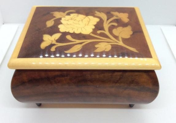 Italian Inlaid Wood Music Box: Blonde and dark toned wood, plastic feet, floral inlay design motif heavy, glossy finish, burlesque wood style, label for REFUGE Swiss musical movement, label for Rita Ford inc, antique music boxes, l
