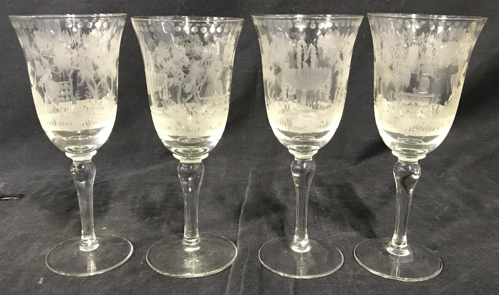 Set 4 Frosted Art Glass Goblets Stemware: Lot includes 4 goblets. Each have intricate frosted detail. Each appear to possibly be crystal. Stemware, goblets, frosted stemware, frosted goblets, Barware. Each measures approximately 8 inches tall