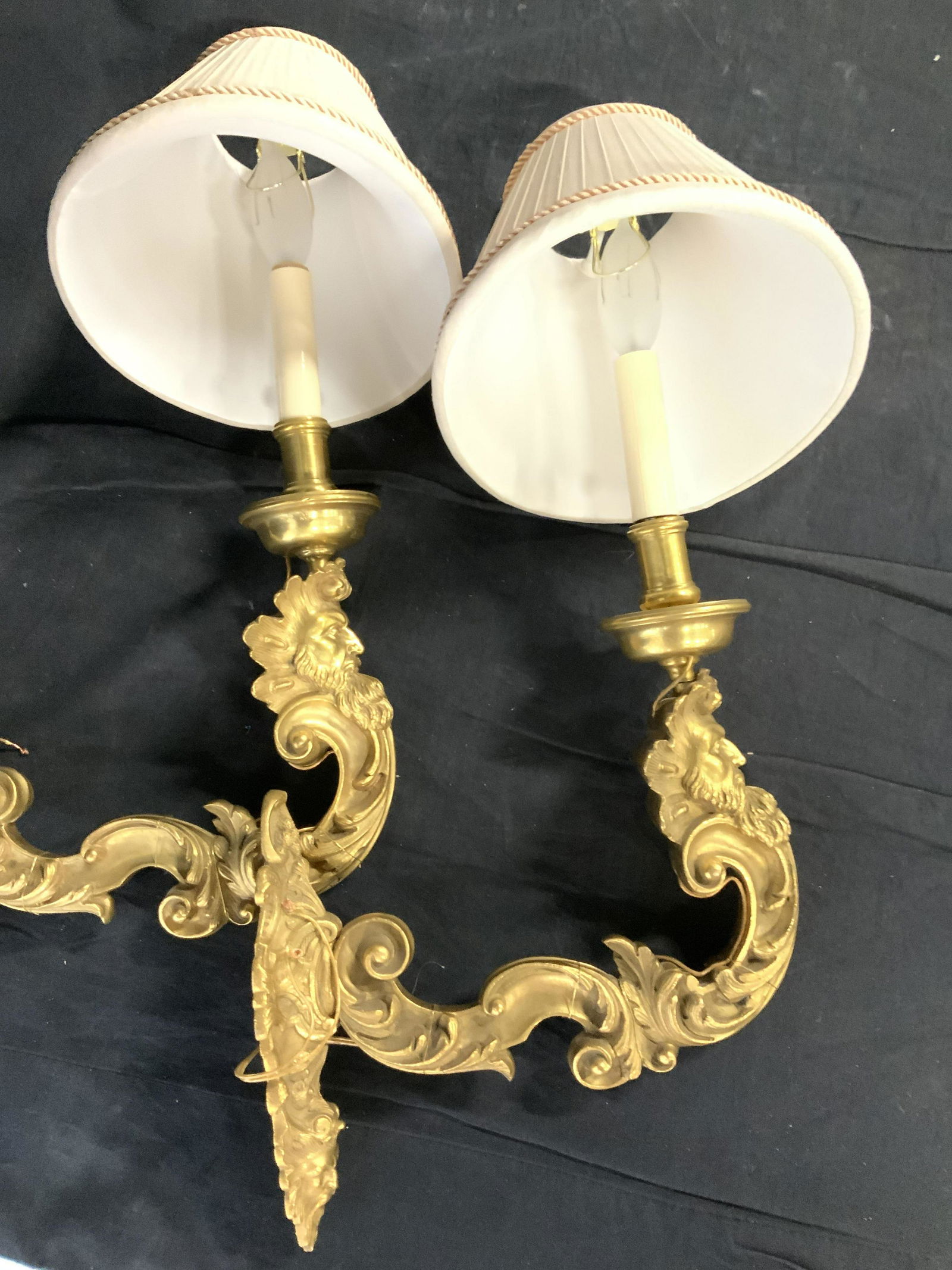 Pair Gilt Metal Art Nouveau Sconces, Mythical Face: Vintage Pair of Gilt metal sconces, possibly bronze, heavyweight. Detailed embossed swirls and scrolls with mythology bearded man feature as central motif on wall plate and on sconce ( Poseidon style