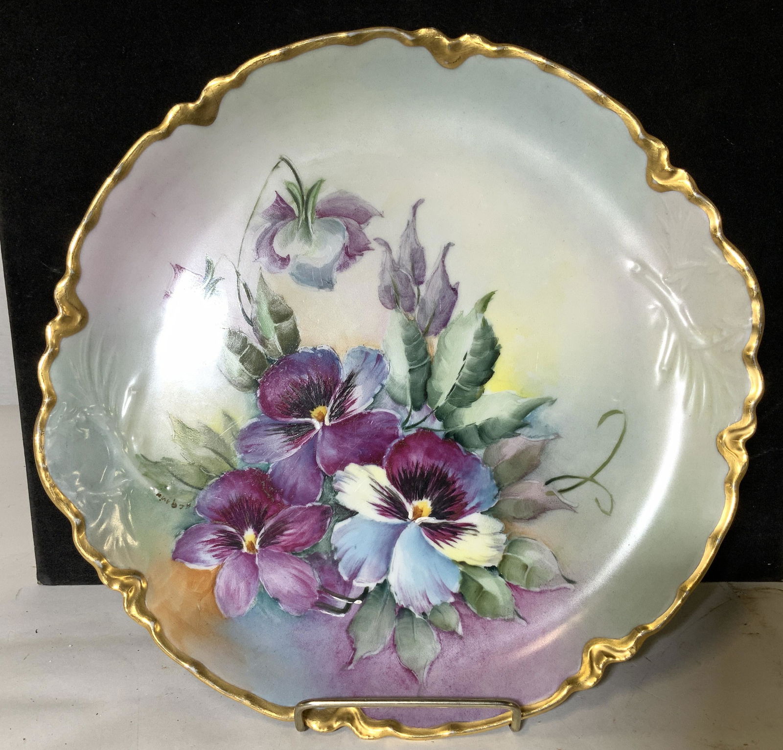HAVILAND LIMOGES France Artist Signed Plate: Hand painted PANSIES in a rich purple on French Porcelain, Hallmarked on verso HAVILAND FRANCE & Signed by artist near flower ( E.C. Gavin) Thick gilt rim on wavy edge. Vintage, early 1900s. 11.25 in.