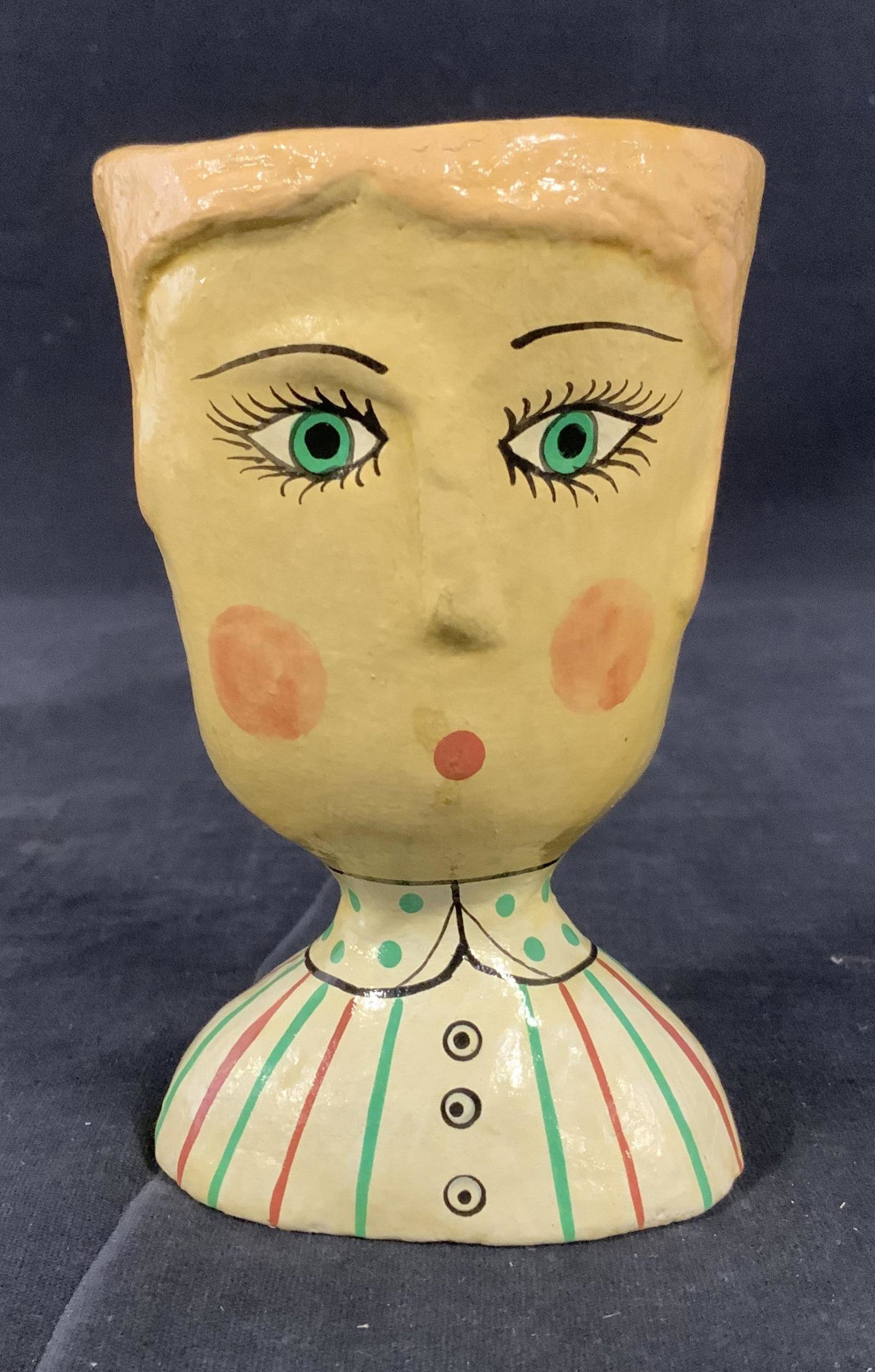 Hand Painted Double Faced Earthenware Cup: Hand painted earthenware cup, possibly clay. Each side of the cup is sculpted and painted to resemble a face, cups are glazed. Clothing detail has been painted onto the figure as well. Measures approx