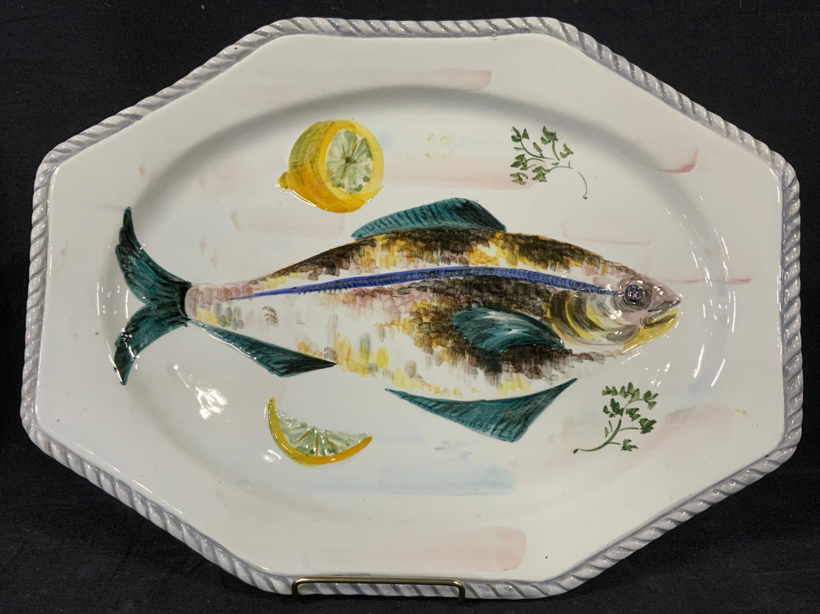 Signed Hand Painted Fish Tray: Hand painted serving tray, possibly vintage. Depicts a fish, surrounded by lemon slices, and other garnishes. Plate edge resembles a twisted rope, the edge is painted in slate tones. Measures approx 1