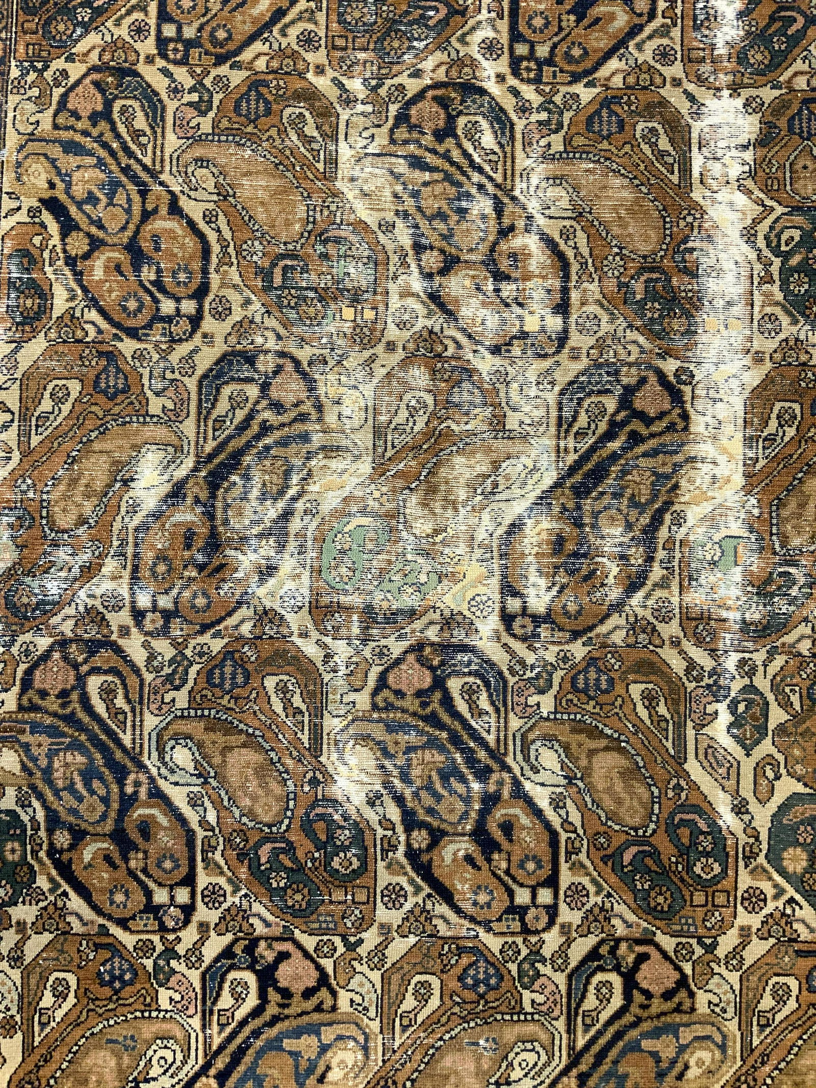 Vintage Handmade Persian Wool Rug: Rug is wool and handmade. Piece is vintage possibly antique. Rug contains intricate multi toned floral, leaf and vine detail. Piece measures approx 78 inches long 57 inches wide. Rug, carpet, area rug