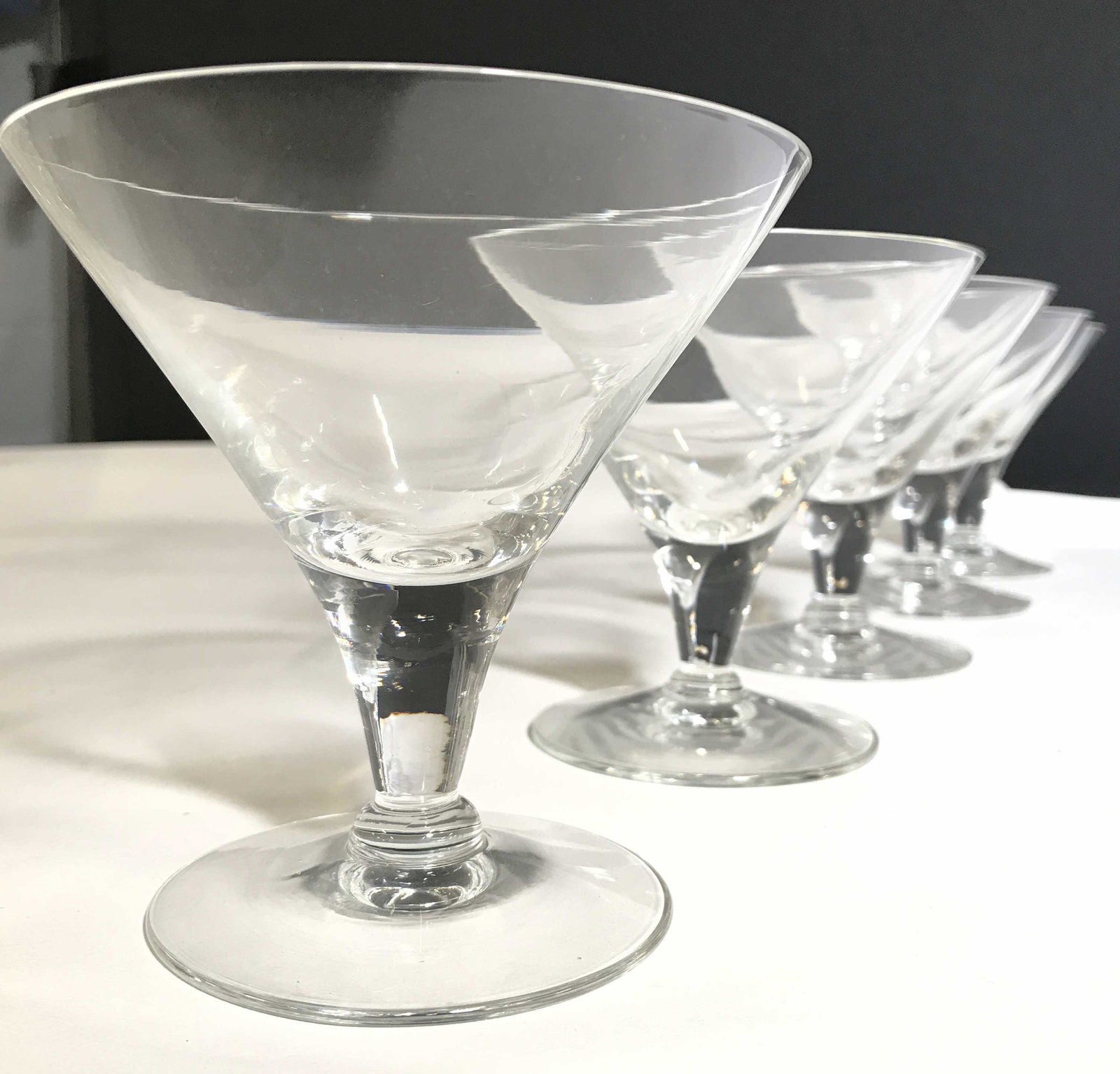 Set 10 Cocktail Glasses: Lot includes 5 tall cocktail glasses & 5 short cocktail glasses. Each appear to be crystal. Larger glasses measure approximately 6 inches tall 4 inches wide. Cocktail glasses, Barware, martini glasses