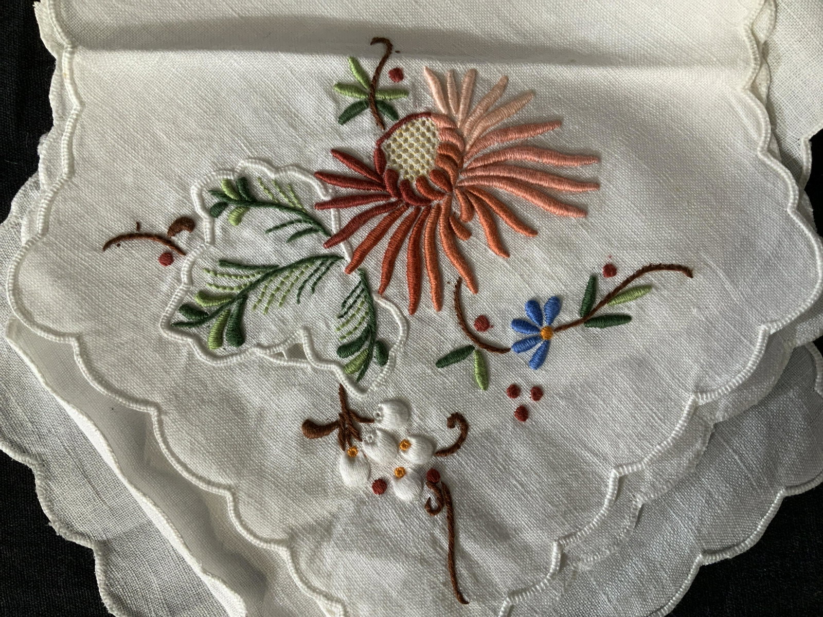 Lot 3 Vintage Embroidered Table Linens: Lot 3 Vintage Embroidered Table Linens, no apparent inscriptions or labels, smallest linen measures 15 7/8 x 15 7/8 inches, ovular line measures 42 3/8 x 15 1/8 inches, largest linen measures 50 3/8 x