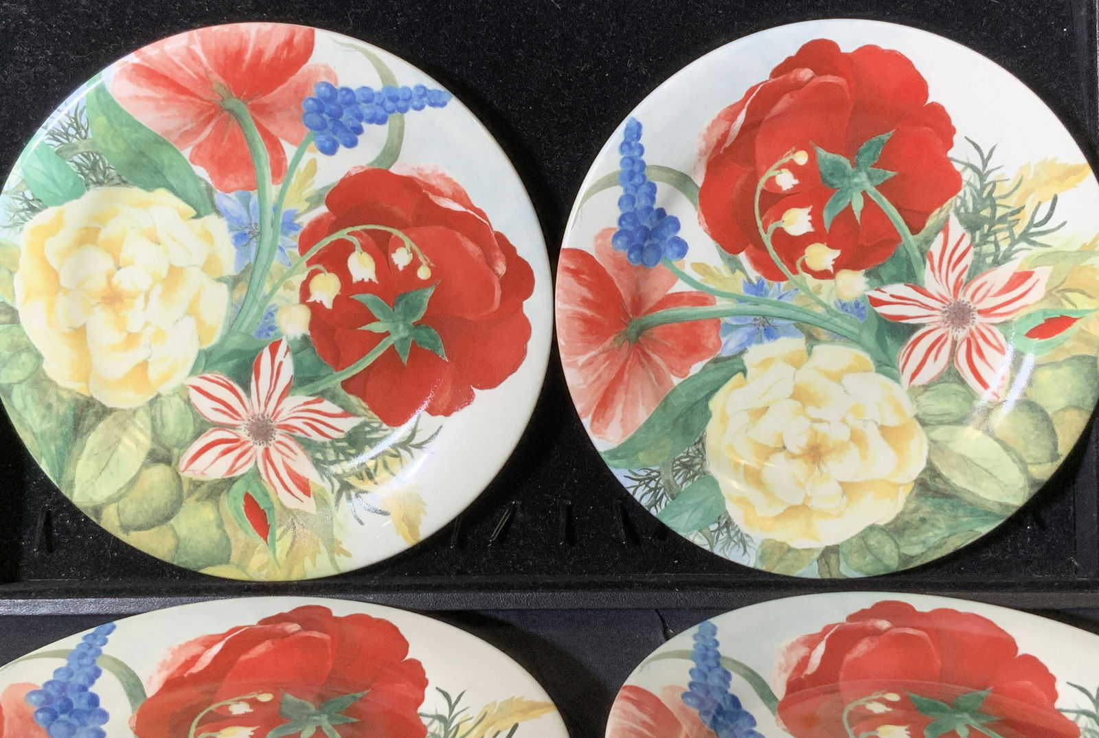 Set 5 ‘ VOLUPTÉ’ GIEN FRANCE Porcelain Plates: Luxury Gien France app 6.5-inch plates. Country Floral and leaves Volupte pattern, reds, blues, greens, yellow on cream white background. Hallmarked GIEN France and handwritten Volupté with story wri