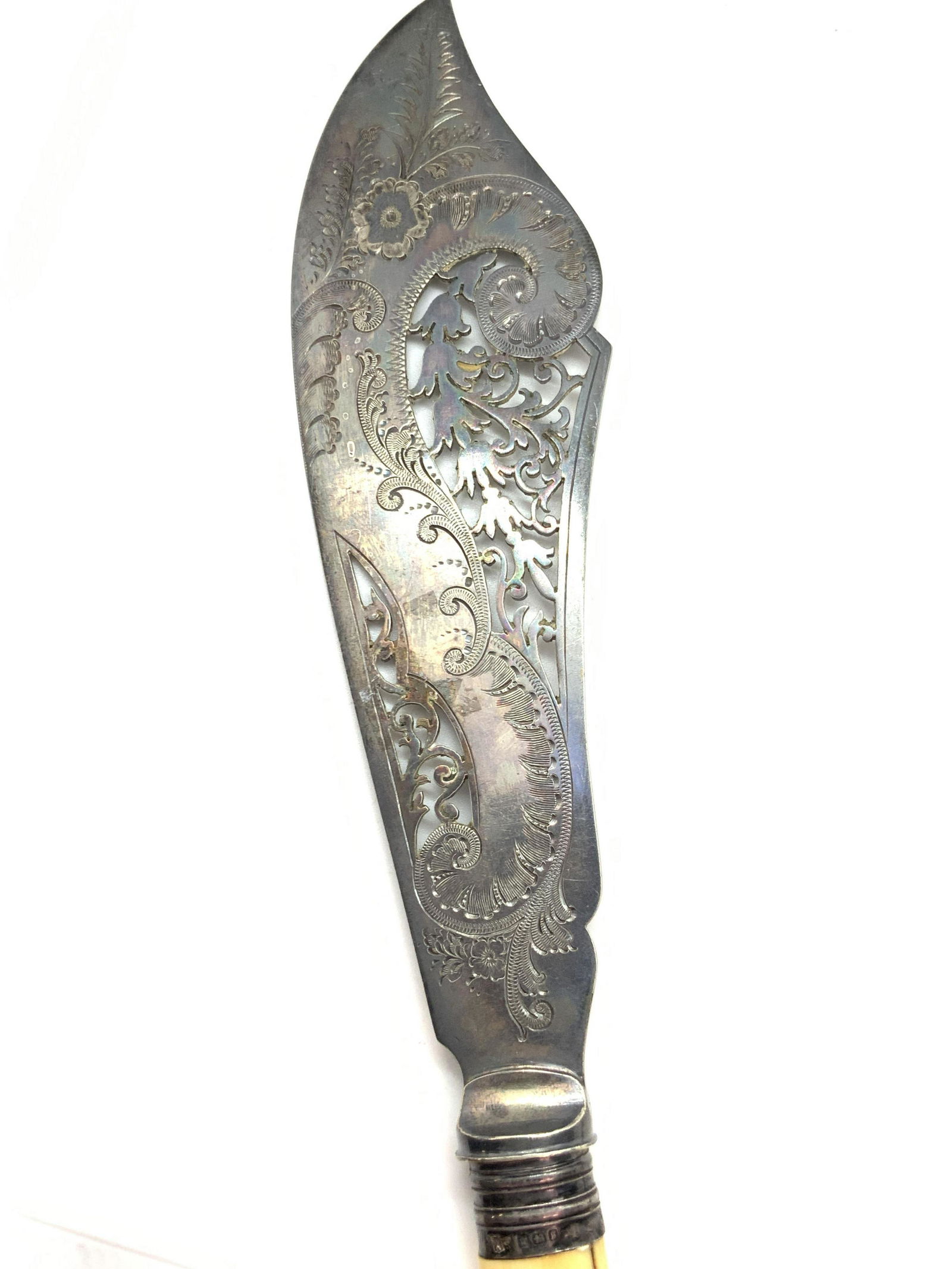 STERLING SILVER Vintage Specialty Serving Utensil: STERLING SILVER Vintage Specialty Serving Utensil. Bone style handles, openwork knife blade with etched floral filigree on one side. Some discoloration to the metal, split in material of handle. Hallm