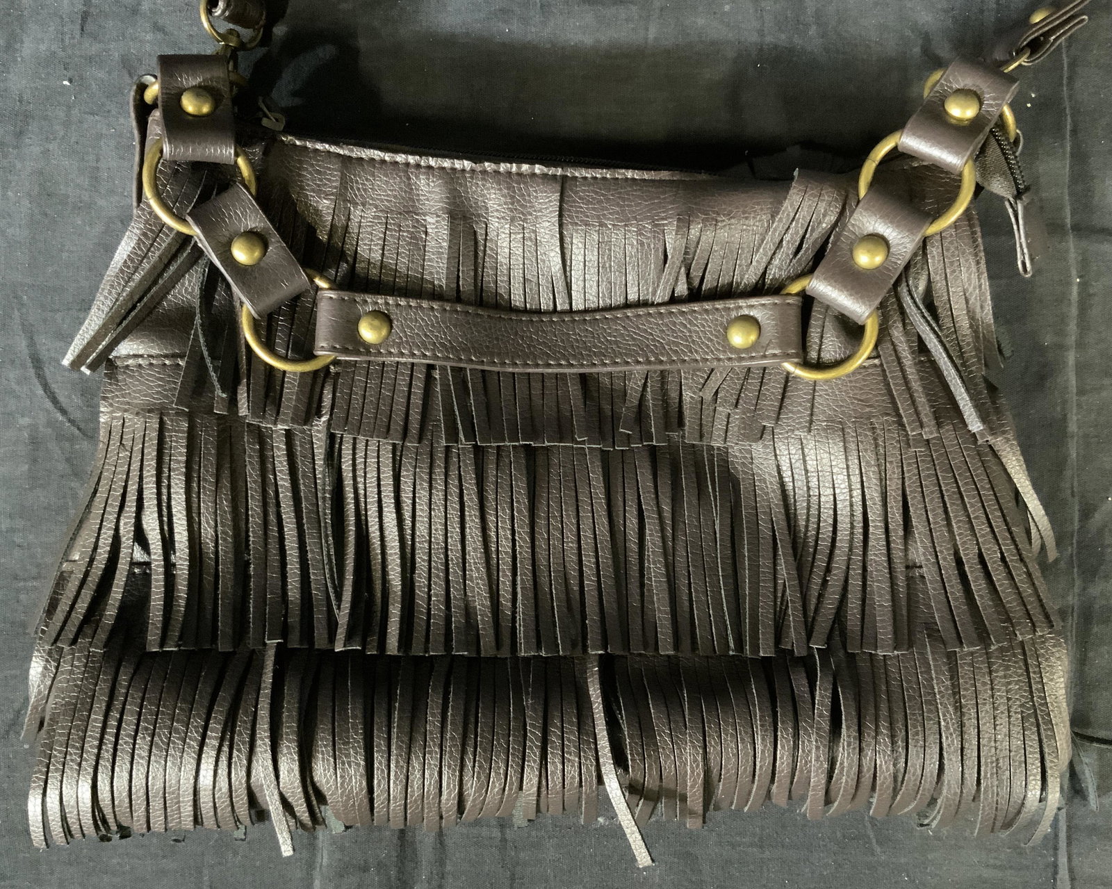 Brown Fringed Shoulder Bag purse: Brown Fringed Shoulder Bag, label to interior reads ‘Made in China Shell 100% PU Lining 65% polyester 35% cotton’, measures 8 1/2 x 12 inches, drop measures 21 inches, overall in good condition, S