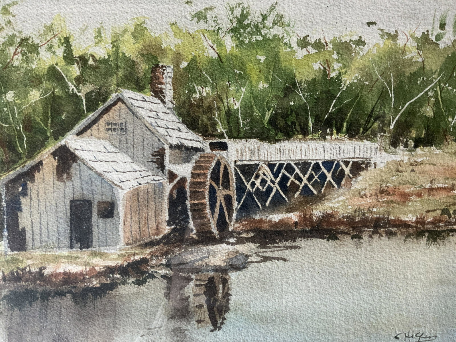 E HILFER Signed Watercolor Painting Artwork: E HILFER Signed Watercolor Painting, signature to lower right reads ‘E Hilfer’, label to reverse reads ‘Walker Gallery & Frame Shops’, subject a water mill by a river, measures 17 1/8 x 21 inc