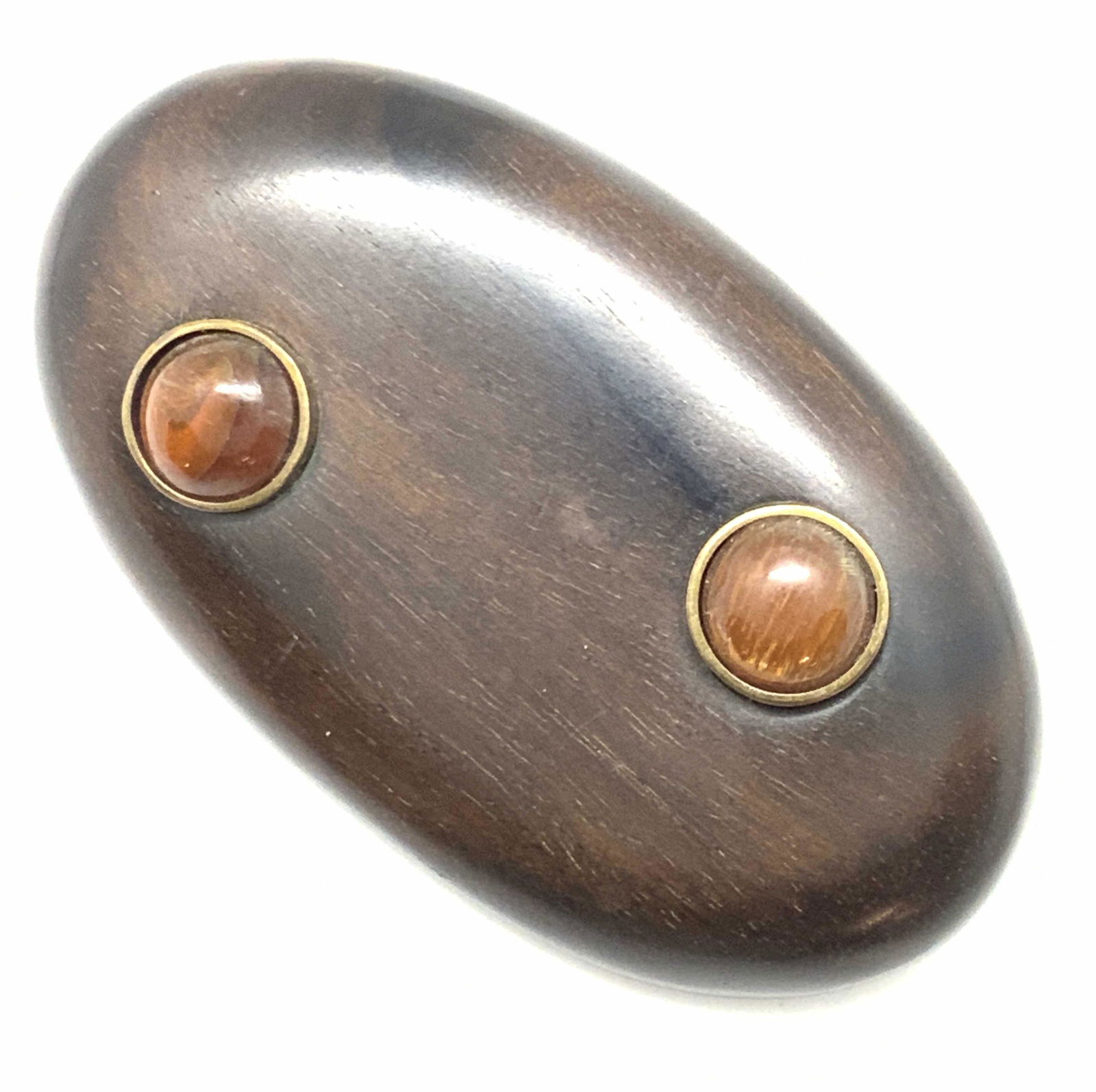 GERDA LYNGGAARD MONIES Signed Wood Brooch Pin: Circa 1980s vintage wooden brooch. The wooden surface is a polished rich brown tone. The topside has two in relief bezel set resinous cabochons. The underside a metal pin closure and a metal insert th