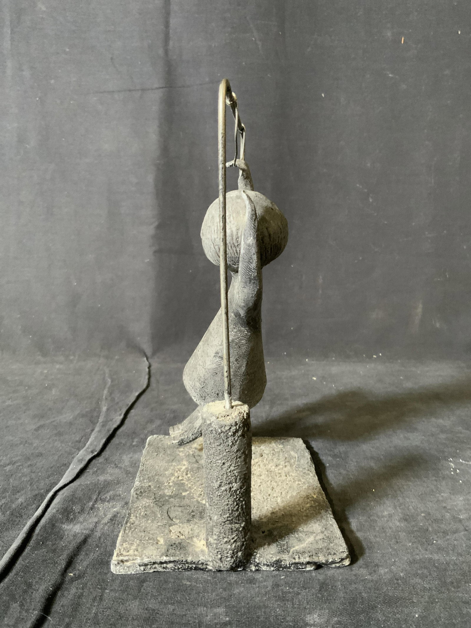 WILLIAM LATTIMER Lead Kinetic Sculpture: WILLIAM LATTIMER Lead Kinetic Sculpture, informational pamphlet contains artist information, measures 8 inches tall x 5 5/8 inches at widest point, figure is missing one hand, overall in good conditio