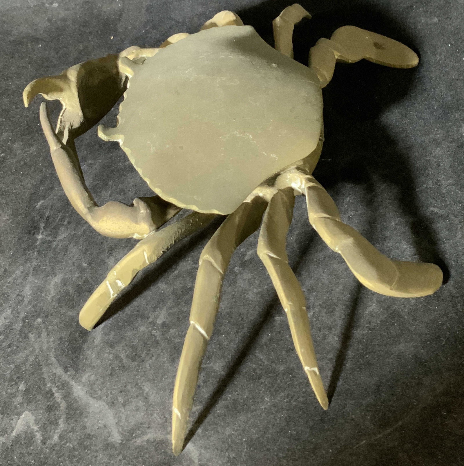 Vintage BRASS STANDING CRAB Form Ashtray: A lidded brass crab form ashtray. This piece features intricate metalwork, such as etching, to bring this sea creature to life. The piece opens with hinge hardware. The lid is the crab’s head, which