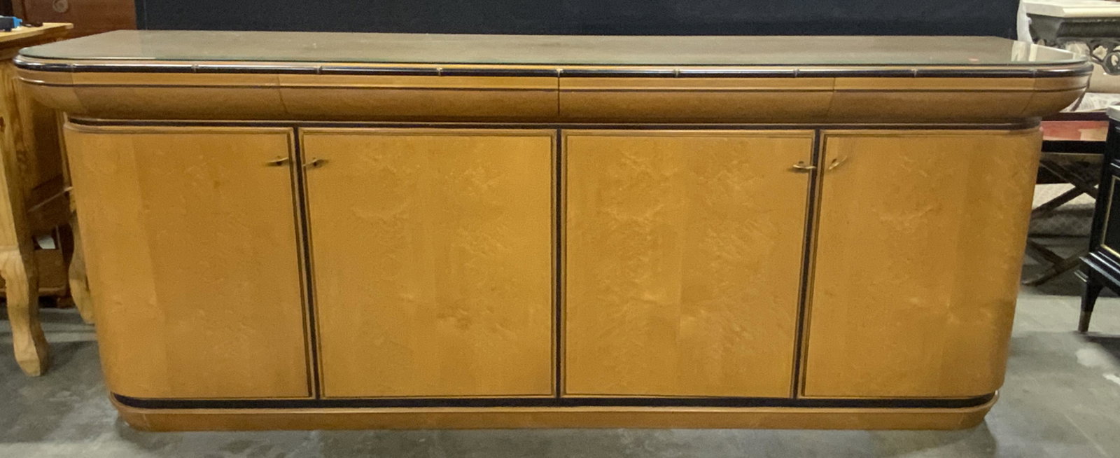 Vintage Glass Topped BIEDERMEIER Style Credenza: Vintage wooden credenza, BIEDERMEIER styled. Four doors, each with brass door pulls. Trim along top resembles bamboo, trim and other detailing ha sheen colored black. Four drawers run along the top of