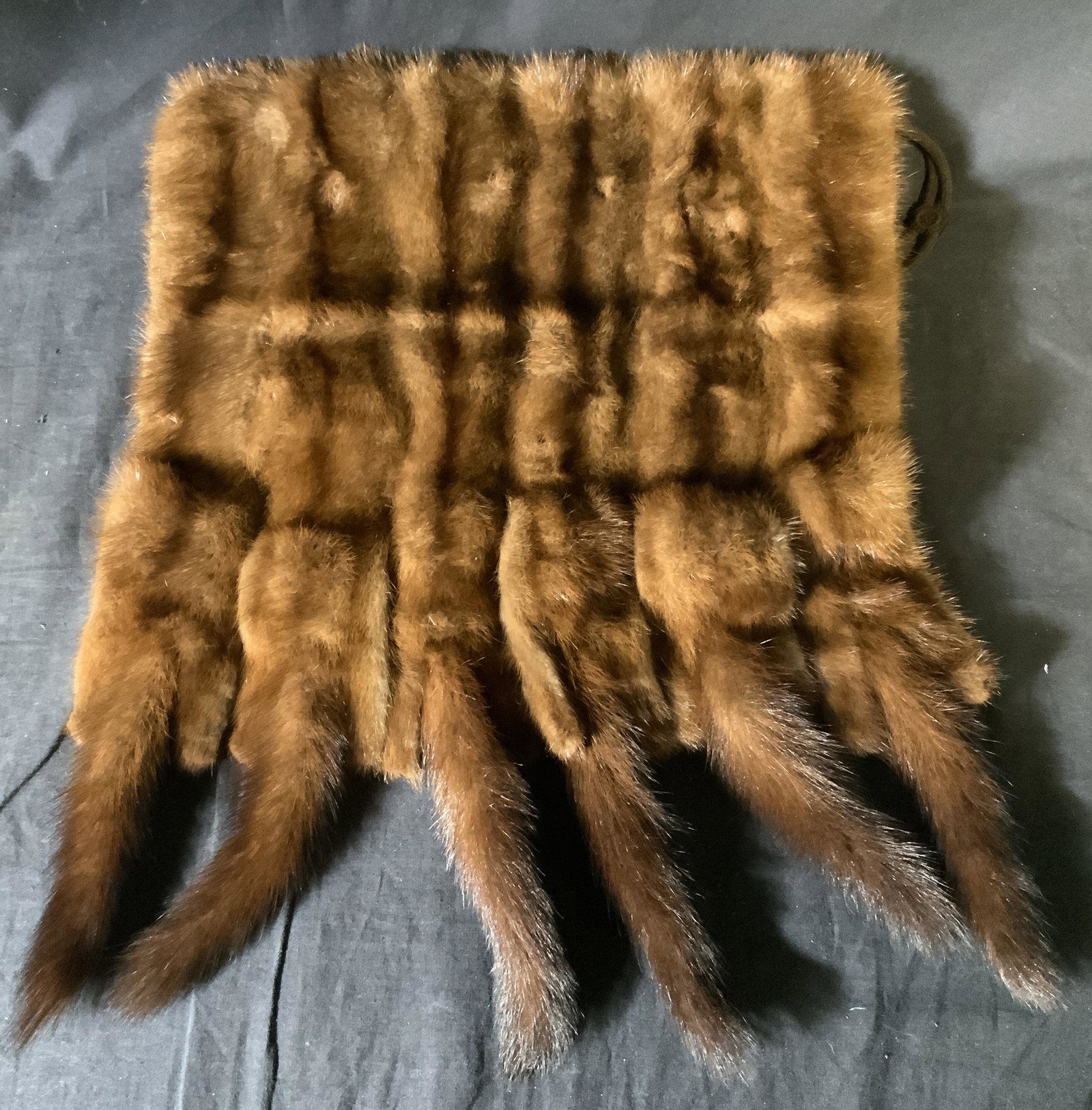 Vintage Mink Style Muff Hand Warmer: Vintage mink style hand warmer. The piece features various brown hues. Measures approx 19 inches long, 14 inches W. Wear is consistent with age and use, some tearing to interior. Minx, faux fur, fur a