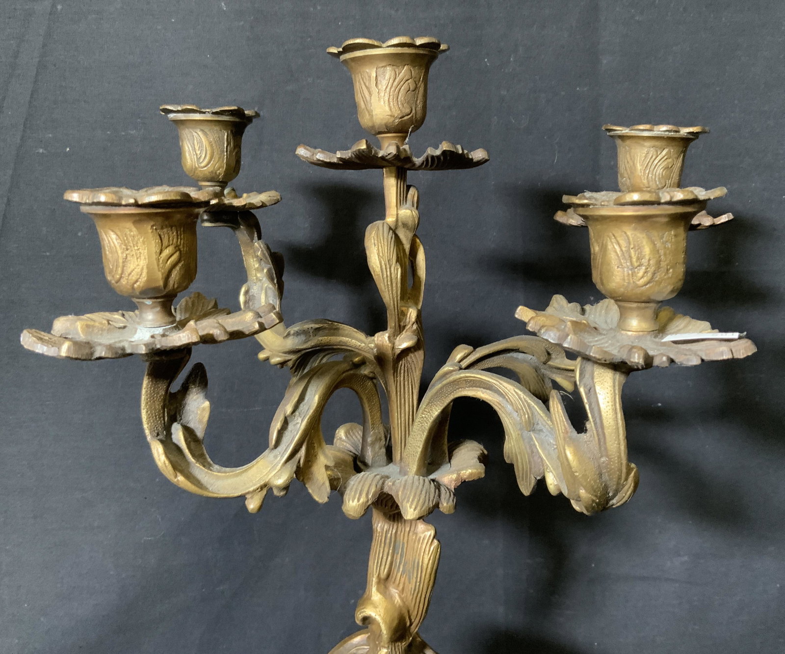 Bronze Art Nouveau Candelabra: Bronze art nouveau candelabra, label to underside reads ‘Castilian Imports Made in India’, piece made to appear as leaves and vines, piece measures approximately 17.5 inches at tallest point, over