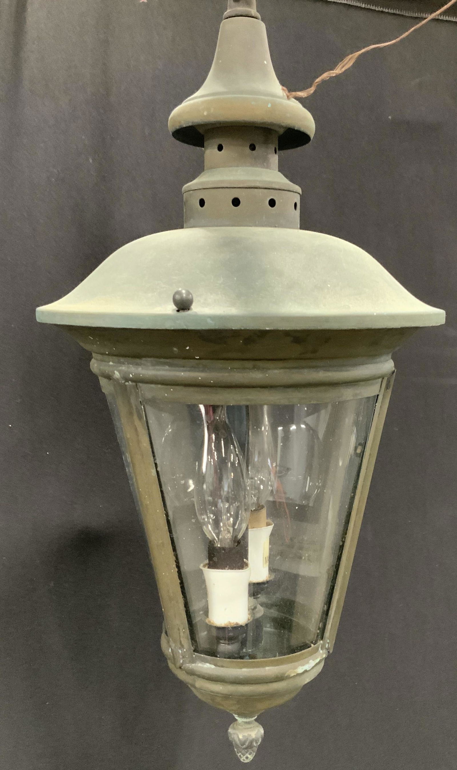 Pair Vintage Street Light Style Outdoor Lanterns: Pair of Early 1900s style of gas Street lamps in brushed antiqued green metal. One is a hanging ceiling lamp, the other is a post lamp. Both suitable for damp locations. Ceiling lamp has 2 chandelier