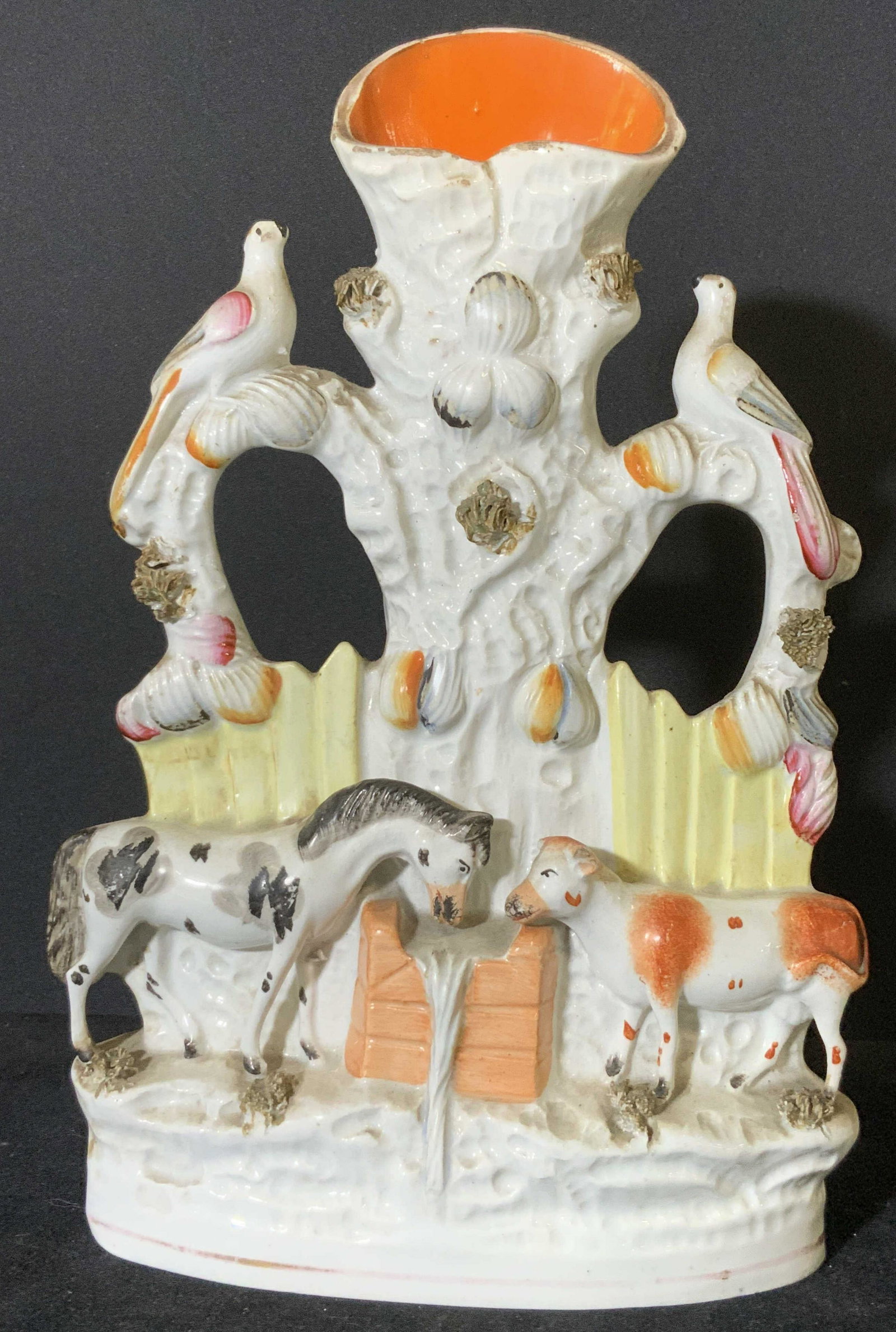STAFFORDSHIRE Antique Porcelain Spill Vase: Circa late 1800s Antique Staffordshire porcelain spill vase with cow and horse figurals. Horse appears to be drinking from the overflowing well. Cow stands adjacent to well. Two birds perched atop dec