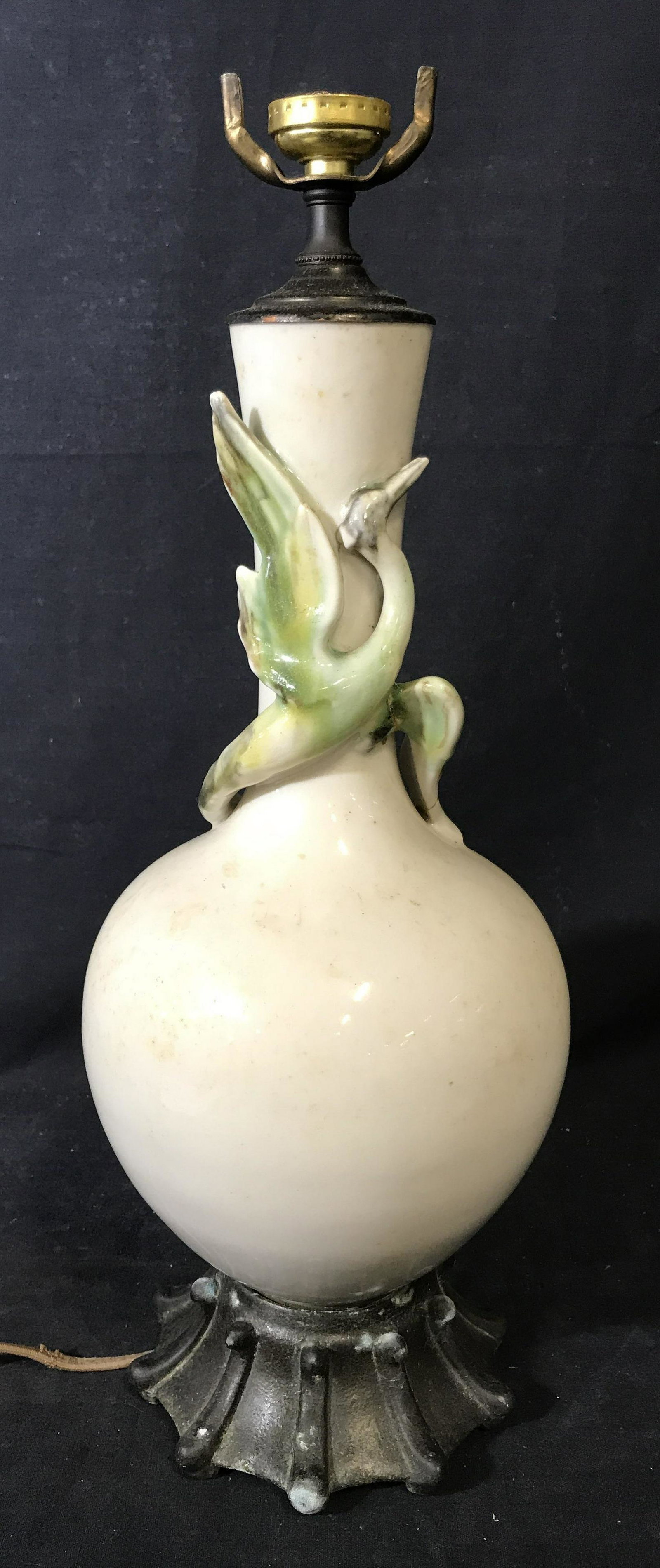 Vintage Porcelain & Bronze Lamp with Crane: Vintage possibly antique porcelain and bronze lamp with crane, no apparent signatures or stamps, subject the base of the lamp is made of a multi footed bronze piece while the body is porcelain shaped 