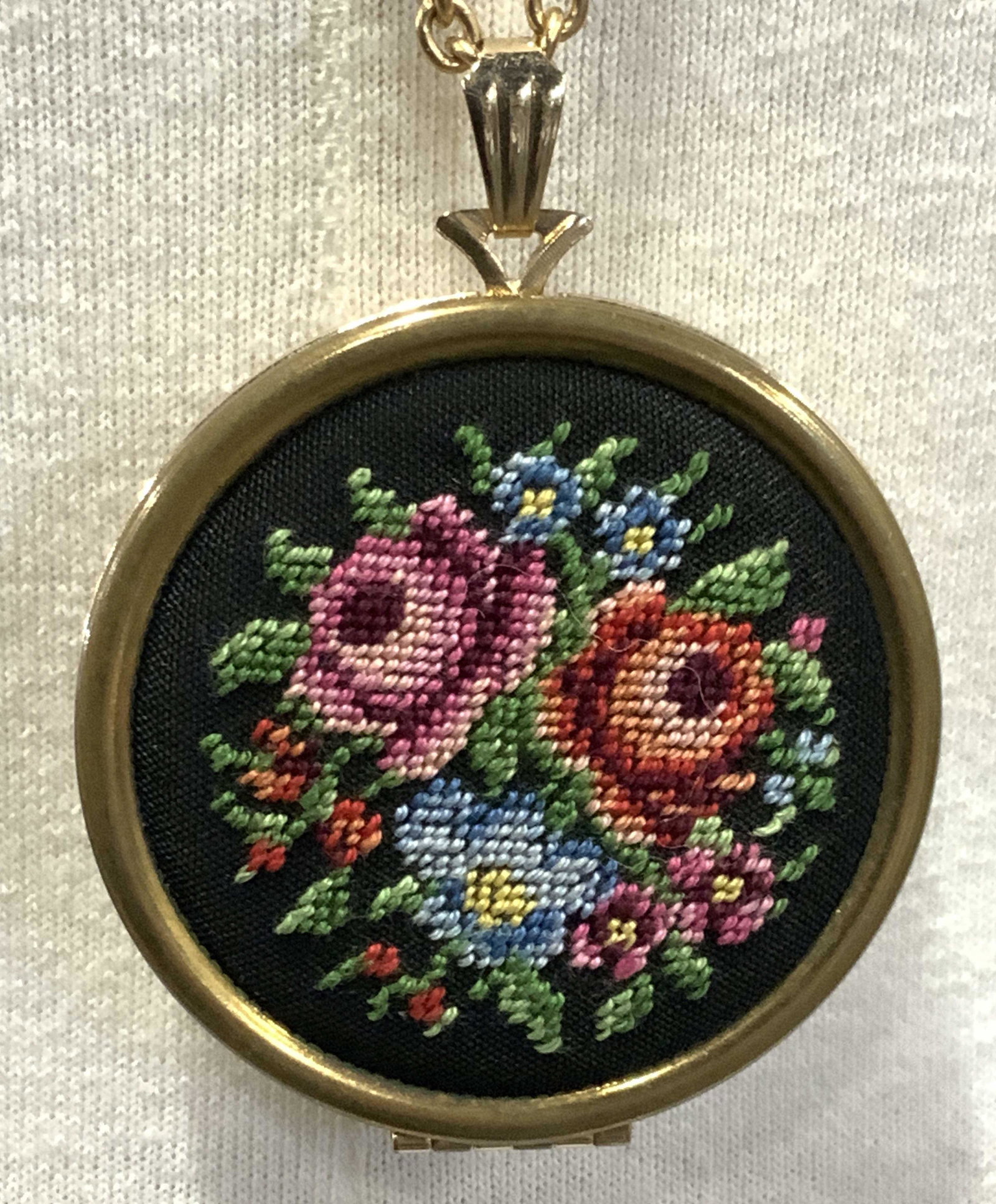 Grp4 Vintage Earrings Embroidered Pendant Necklace: A long chain Necklace with embroidered floral pendant/ locket, opens for you to add a picture. Large size app 2 in diameter, chain 30 in. Signed AVON. 3 pairs vintage earrings, 2 for pierced ears. One