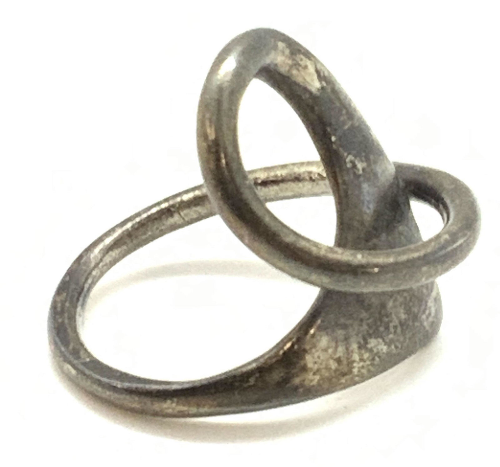 Vintage Silver Handcrafted Abstract Form Ring: Vintage, possibly antique, silver handcrafted ring. A wrapped, twisted abstract design. Approx. Size 8. Tested for.800 silver with the Puritest Tester kit. Mild wear to metal due to age and use. Vinta