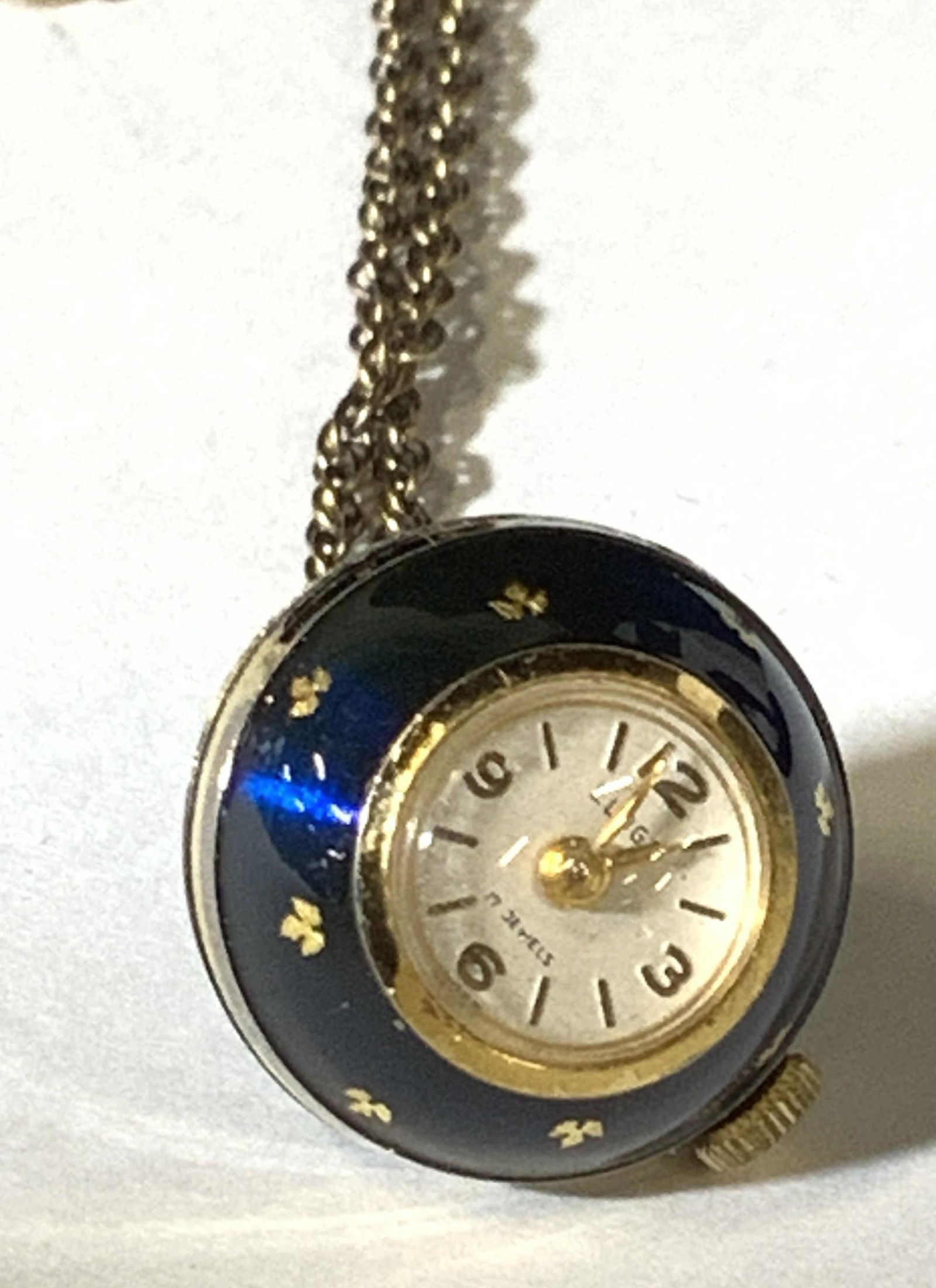 ELOGA Globe Ball Watch Pendant on Necklace: Swiss Made ELOGA globe ball pendant, c. 1960s . High grade movement running on 17 jewels. Hallmarked on watch. Long chain not original to piece, possibly gold filled. Clasp reads 1/120 12. original EL