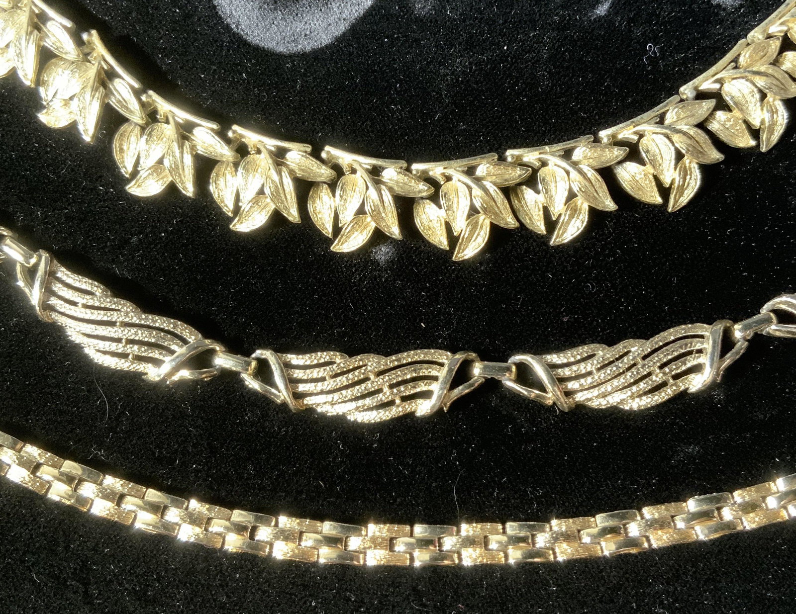 Lot 3 Vintage CORO Signed Necklaces, Jewelry: Lot 3 Vintage CORO Necklaces, inscription to necklaces reads ‘Coro’, necklaces measure 16 7/8, 19 1/4, and 16 7/8 inches long, some surface wear to pieces but overall in good condition. Pieces sec