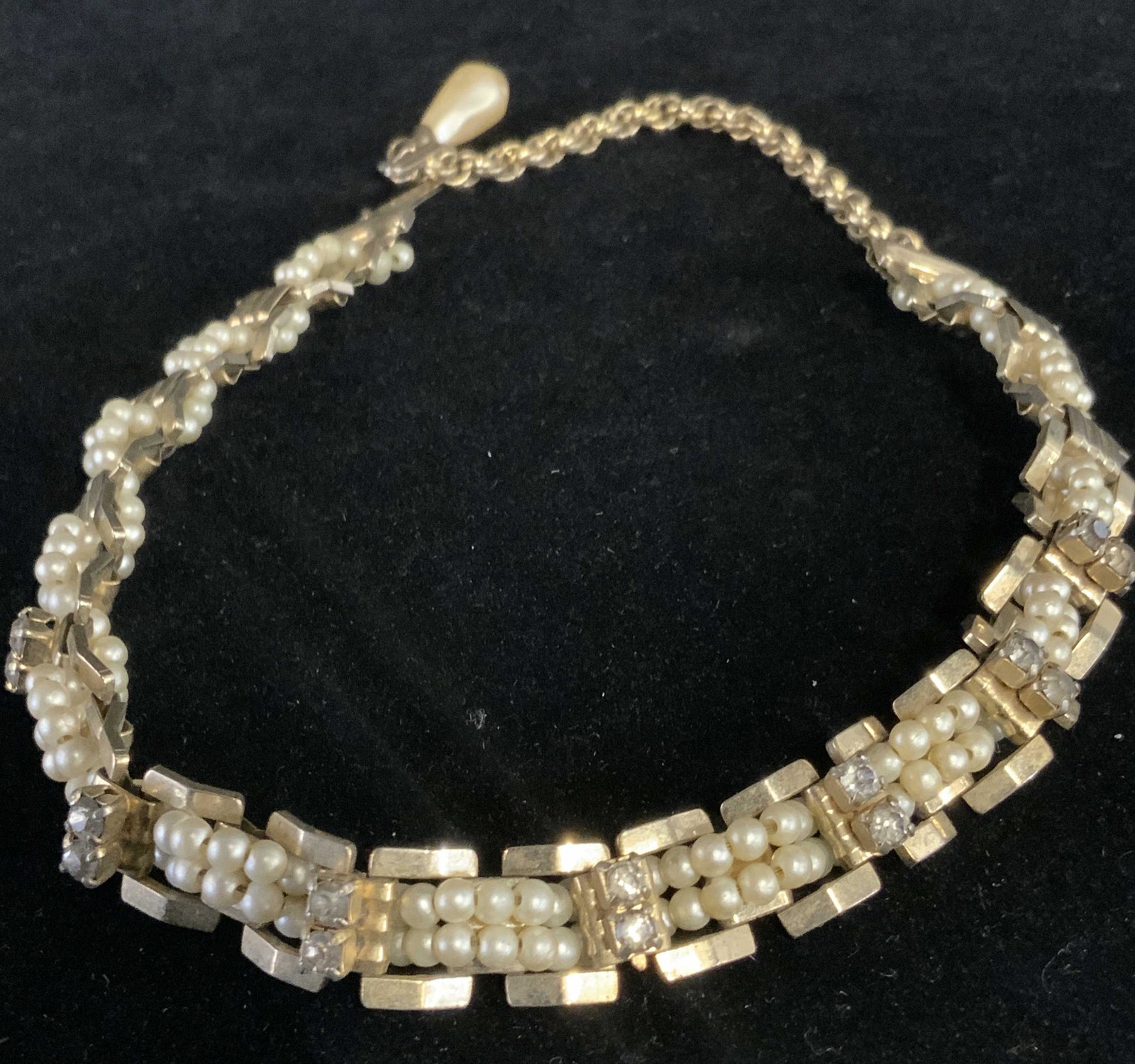 Antique Pearlescent Choker Necklace, Jewelry: Circa 1920s antique gold tone metal choker necklace with pearlescent beads and rhinestones. Rhinestones are colorless and faceted. The pearlescent beads are woven between the metal panels. The piece s