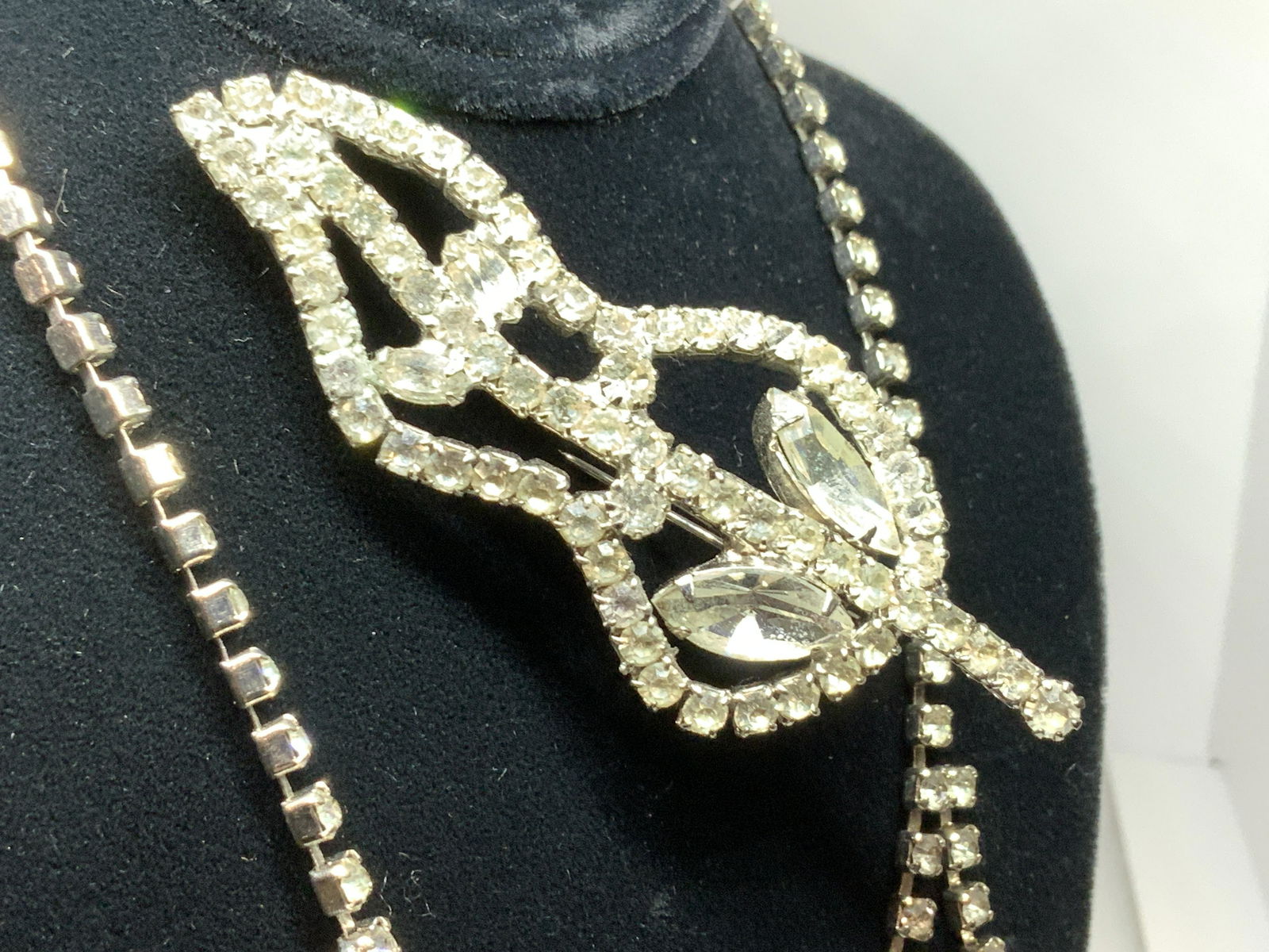 Grp 2 Mid Century Rhinestone Brooch + Choker Neck: Double the sparkle with a mid century leaf form clear rhinestone brooch w 15 mm marquis stones and round stones all prong set. 3 in. Long. Necklace has a bit of Art Deco Elegance with 10 mm black marq