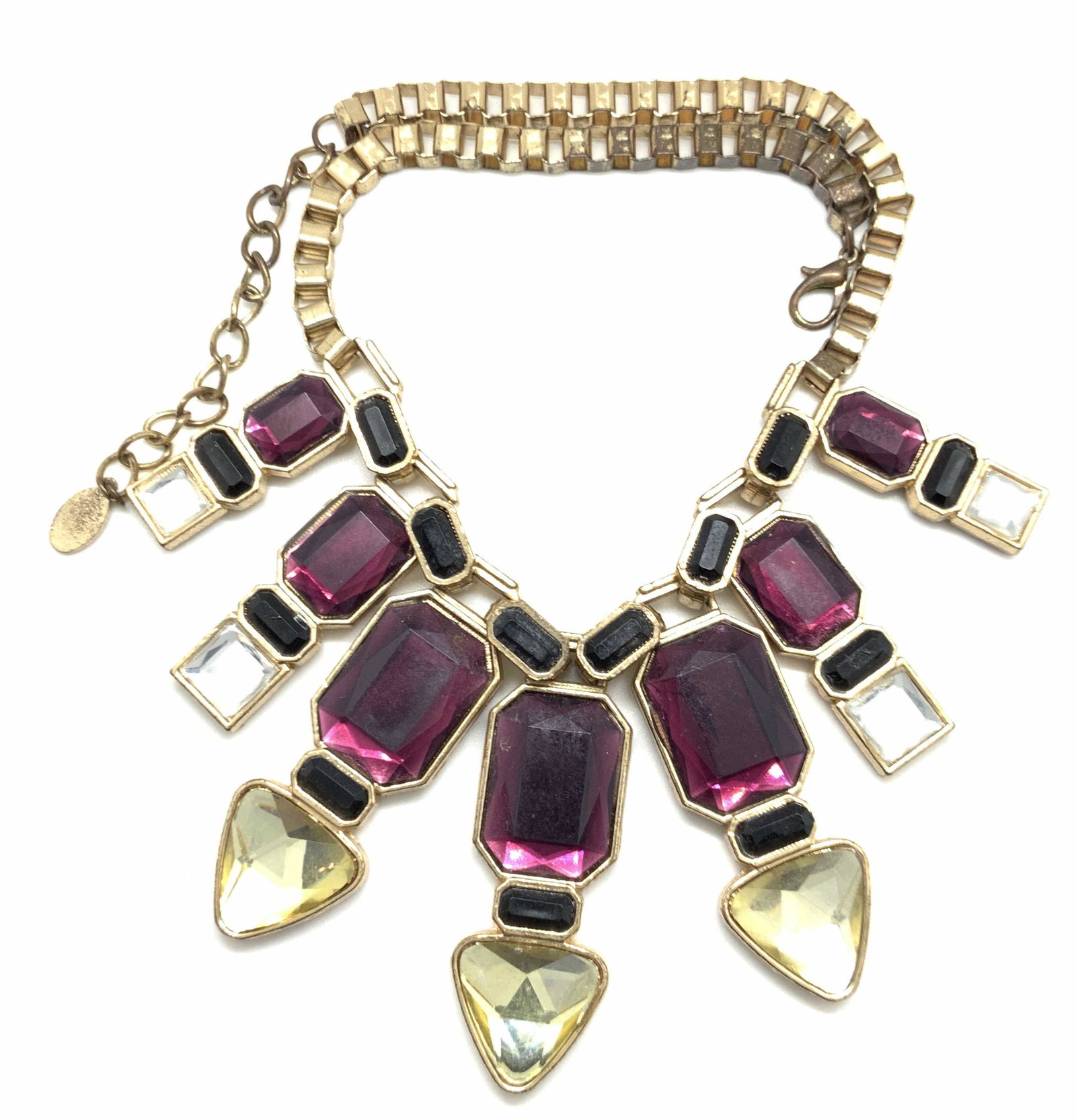 OPIA Signed Chunky Statement Necklace, Jewelry: A chunky statement piece necklace crafted from gold tone metal and adorned with faceted gems. The gems are placed in the center in a bib style fashion. Colors include pink, black, colorless, yellow hu