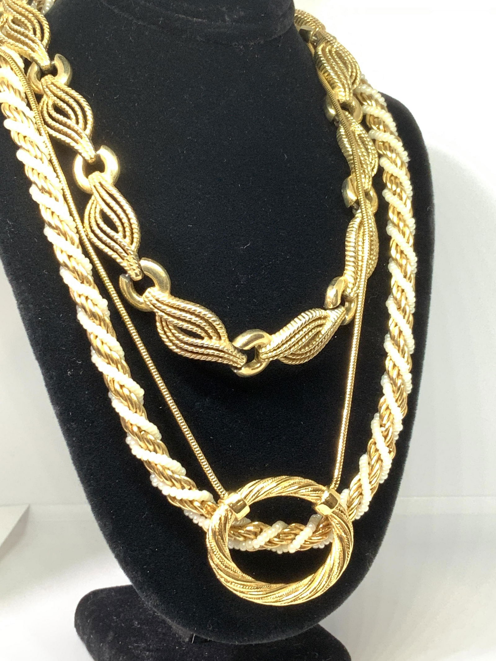 Lot 3 TRIFARI Vintage Signed Necklaces: Various styles of necklaces, signed Trifari , collar, choker length. Twisted rope of white seed beads and gold tone. C spring clasp, signed with Crown Trifari, 14 in. Pierced etched rope pattern links