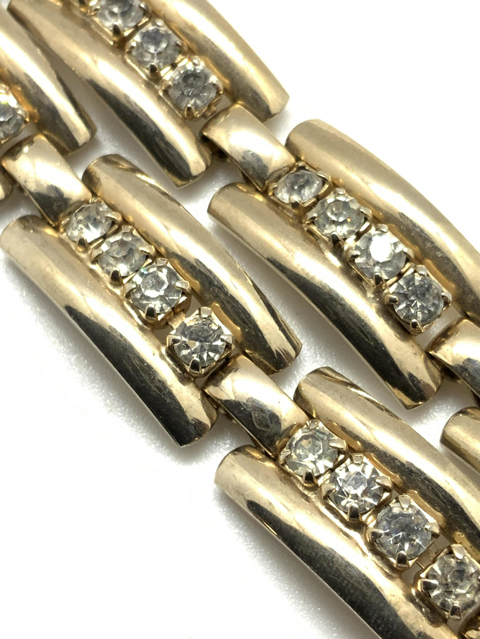 2pc Coordinating Set Rhinestone Bracelet & Choker: Two pieces of jewelry that can be worn together or separately. This matching set features a bracelet and a choker style necklace crafted from a polished gold tone metal & studded with rhinestones. Rhi