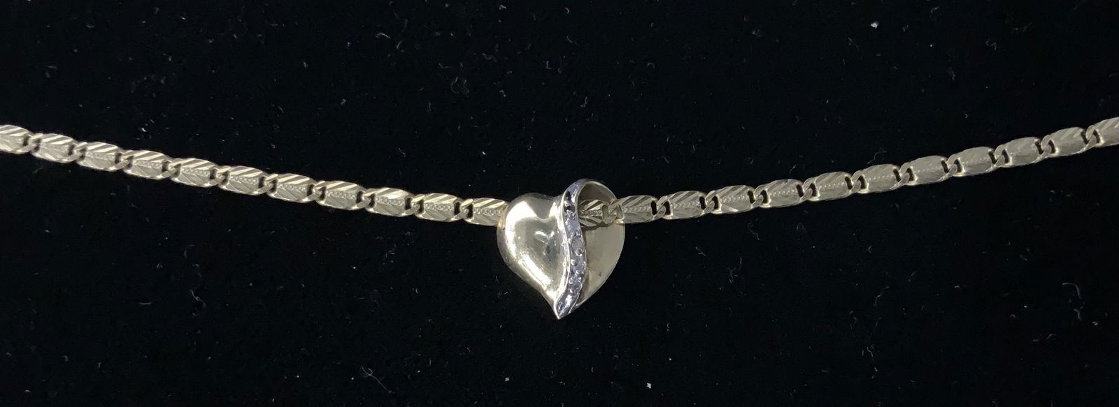 14 KT Gold Bracelet with Diamond Charm, ITALY: 14 KT Gold Bracelet with Diamond Inlaid Heart Charm, Italy, lobster clasp, inscriptions read ‘585’ and ‘14 KT’, ‘Italy’, stones tested as Diamond on Presidium tester, measures 9 1/2 inches