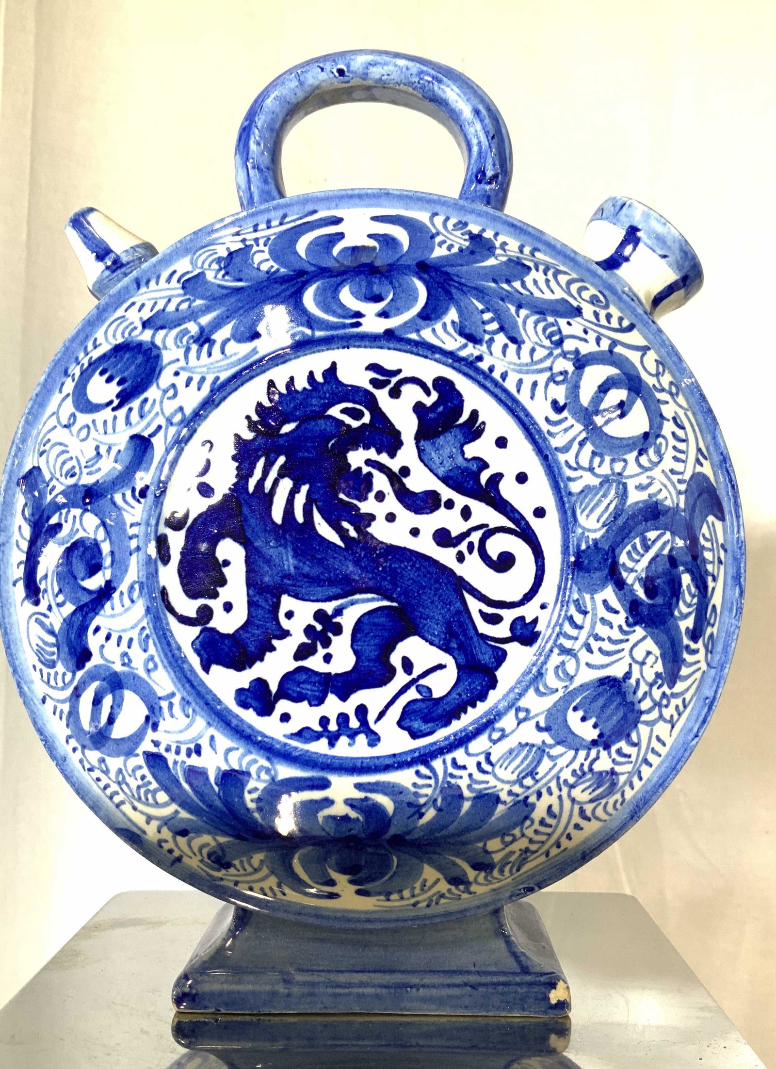 ASIAN DRAGON PORCELAIN MOON FLASK: Ming Style Moon Flask, a collectible Blue and White Asian Stoneware, vintage, no marks, center decor of dragon and bird with hand painted decor. 8 in. Wide, 10 in. Tall. Asian Ceramic Porcelain, Colle