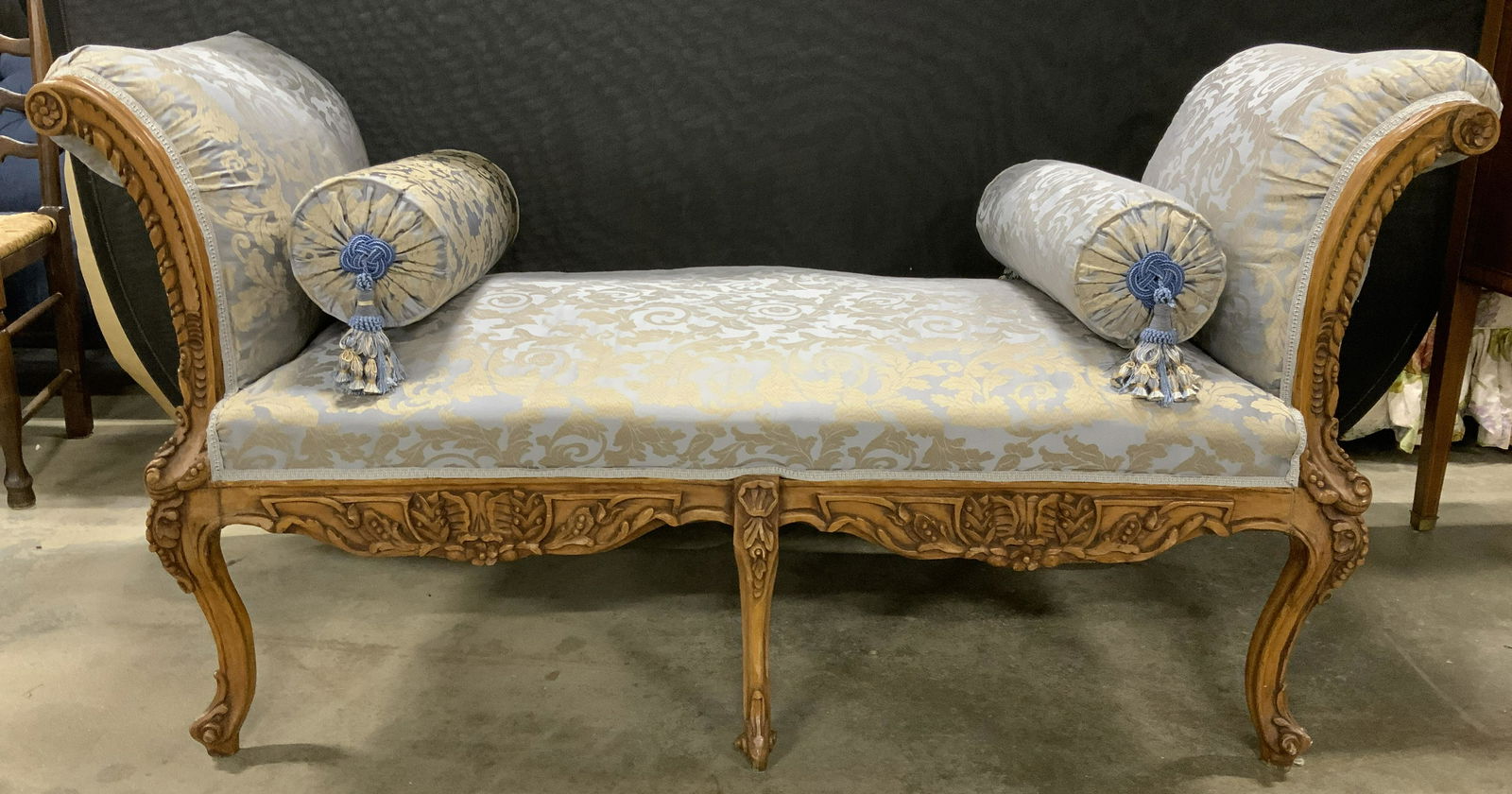 Antique French Carved Wood Chaise Lounge Bench: Antique country French bench with high scrolled sides. Piece contains s scrolls & c scrolls, leaf detail, & cabriole style legs. Piece appears to be newly upholstered in fortuny style with silk fabric